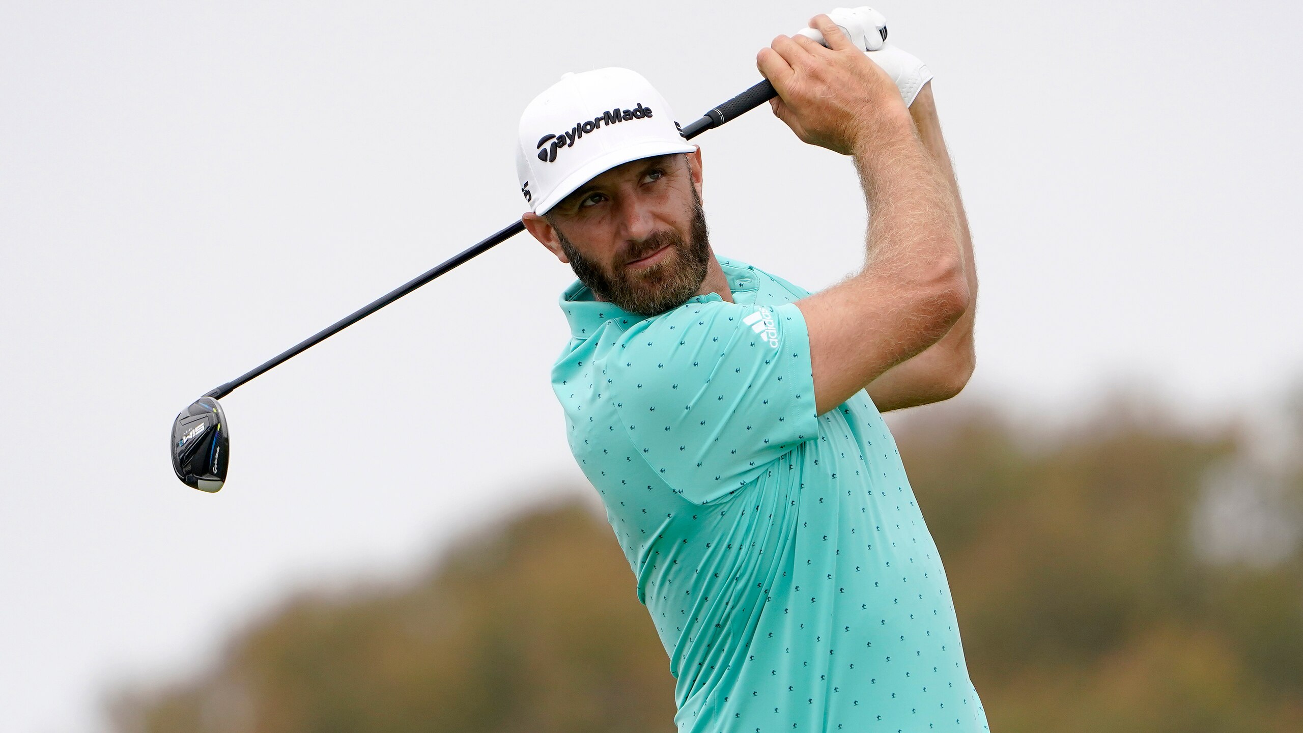 Dustin Johnson plays his shot from the second tee during a practice round of the U.S. Open Golf Championship, Wednesday, June 16, 2021, at Torrey Pines Golf Course in San Diego. (AP Photo/Jae C. Hong)