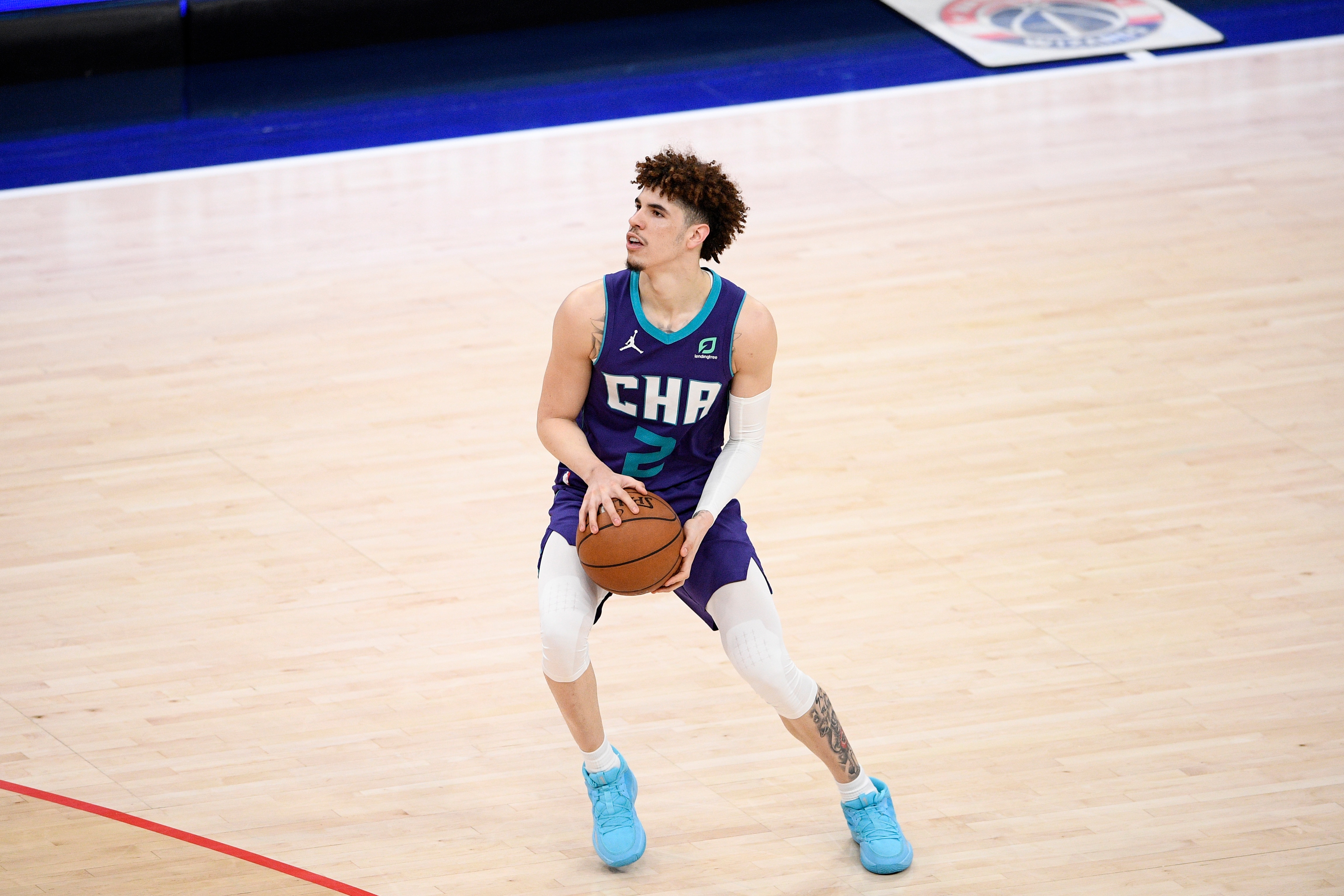 Charlotte Hornets guard LaMelo Ball (2) in action during the second half of an NBA basketball game against the Washington Wizards, Sunday, May 16, 2021, in Washington. (AP Photo/Nick Wass)