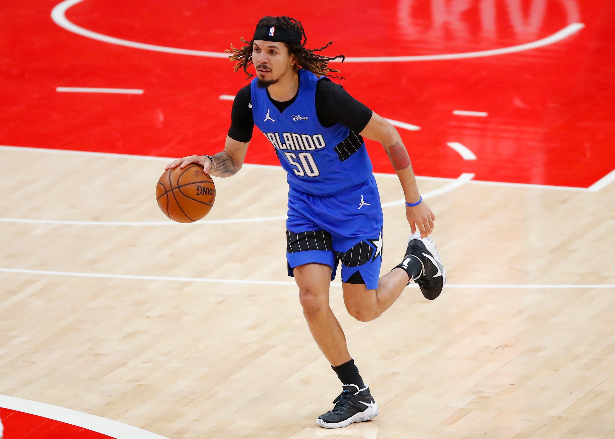 ATLANTA, GA - MAY 13: Cole Anthony #50 of the Orlando Magic drives downcourt during the first half against the Atlanta Hawks at State Farm Arena on May 13, 2021 in Atlanta, Georgia. NOTE TO USER: User expressly acknowledges and agrees that, by downloading and/or using this photograph, user is consenting to the terms and conditions of the Getty Images License Agreement. (Photo by Todd Kirkland/Getty Images) ATLANTA, GA - MAY 13: Cole Anthony #50 of the Orlando Magic drives downcourt during the first half against the Atlanta Hawks at State Farm Arena on May 13, 2021 in Atlanta, Georgia. NOTE TO USER: User expressly acknowledges and agrees that, by downloading and/or using this photograph, user is consenting to the terms and conditions of the Getty Images License Agreement. (Photo by Todd Kirkland/Getty Images)