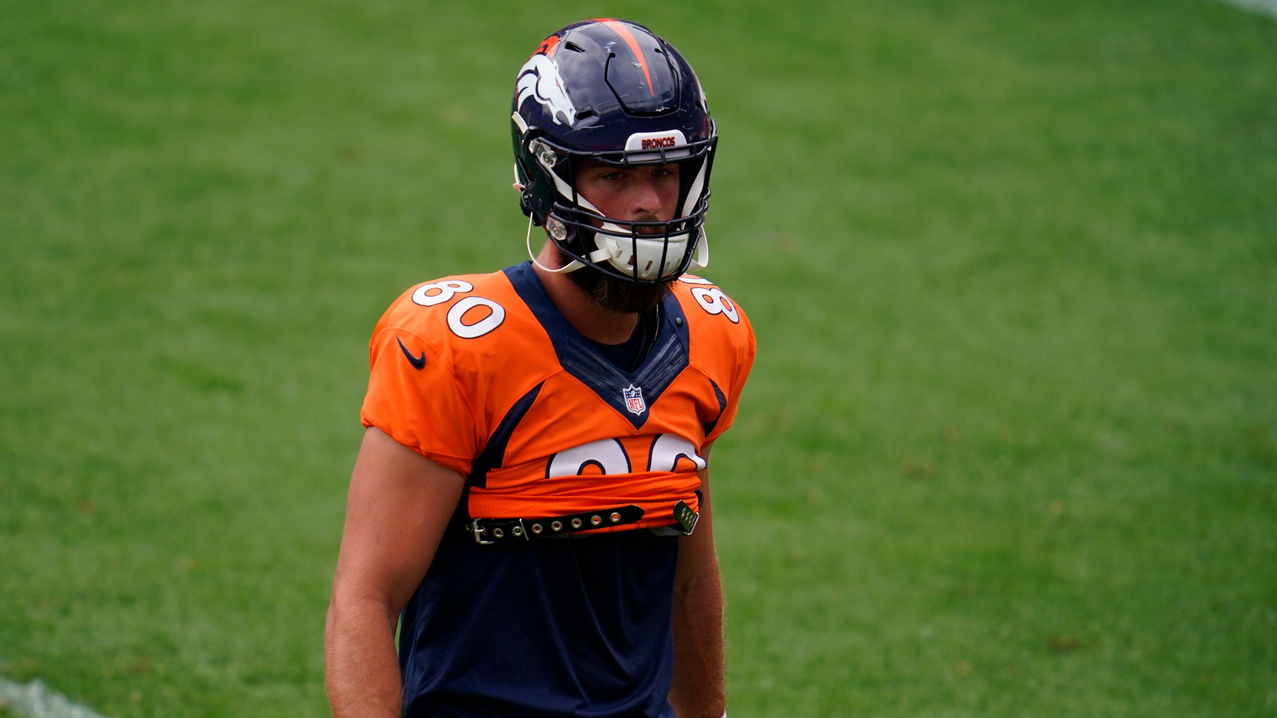 Denver Broncos tight end Jake Butt (80) takes part in drills during an NFL football practice in empty Empower Field at Mile High Saturday, Aug. 29, 2020, in Denver. (AP Photo/David Zalubowski) Denver Broncos tight end Jake Butt (80) takes part in drills during an NFL football practice in empty Empower Field at Mile High Saturday, Aug. 29, 2020, in Denver. (AP Photo/David Zalubowski)