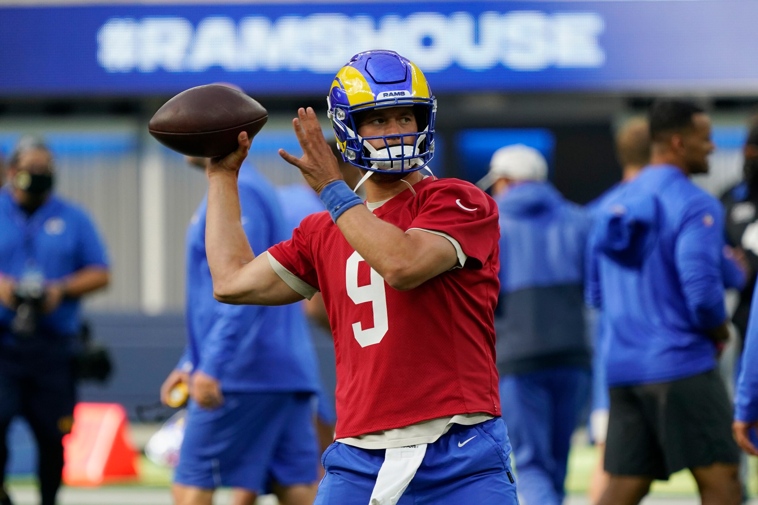 Los Angeles Rams quarterback Matthew Stafford throws during NFL football camp Thursday, June 10, 2021, in Inglewood, Calif. (AP Photo/Marcio Jose Sanchez)