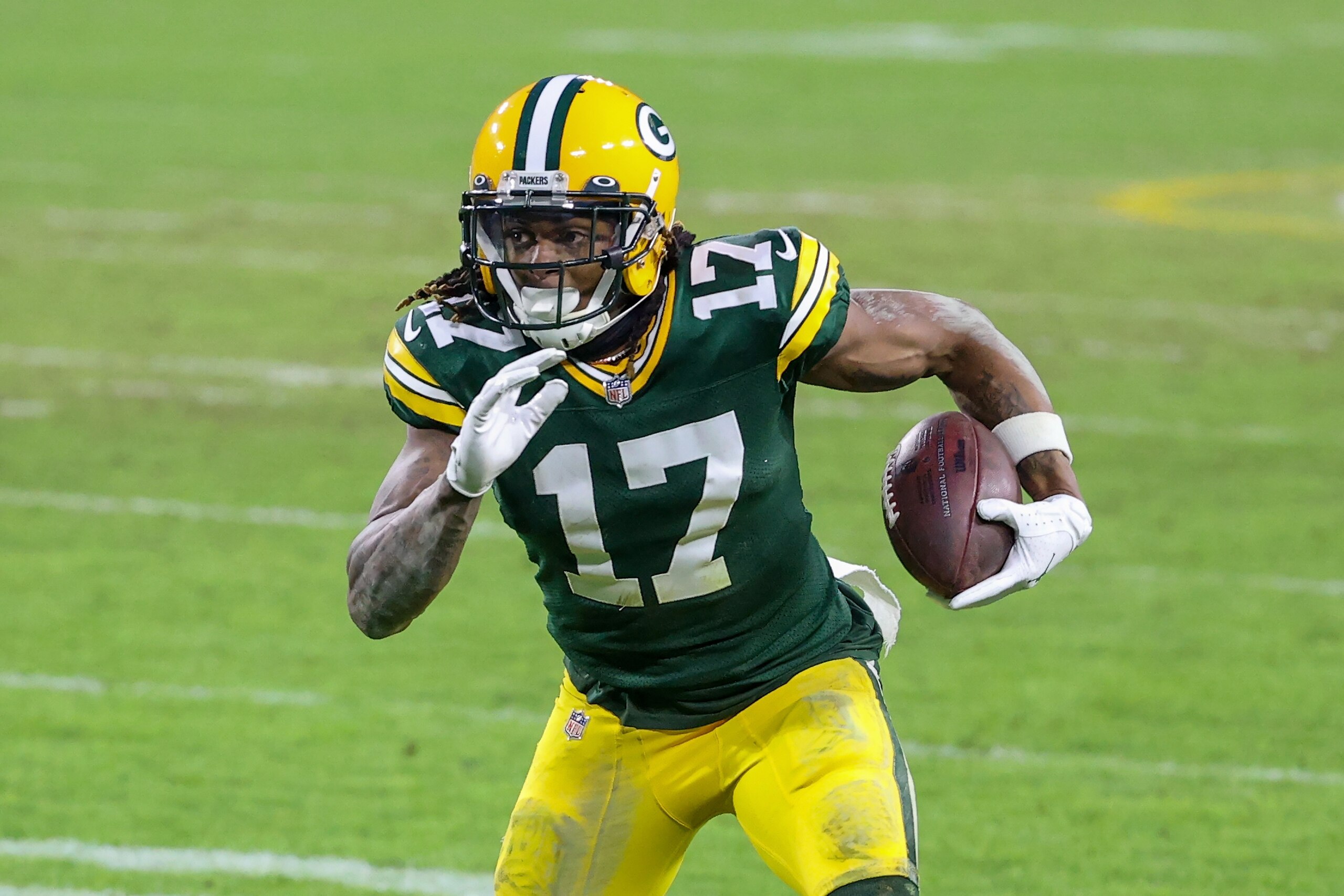GREEN BAY, WISCONSIN - JANUARY 24: Davante Adams #17 of the Green Bay Packers runs with the ball in the fourth quarter against the Tampa Bay Buccaneers during the NFC Championship game at Lambeau Field on January 24, 2021 in Green Bay, Wisconsin. (Photo by Dylan Buell/Getty Images) GREEN BAY, WISCONSIN - JANUARY 24: Davante Adams #17 of the Green Bay Packers runs with the ball in the fourth quarter against the Tampa Bay Buccaneers during the NFC Championship game at Lambeau Field on January 24, 2021 in Green Bay, Wisconsin. (Photo by Dylan Buell/Getty Images)