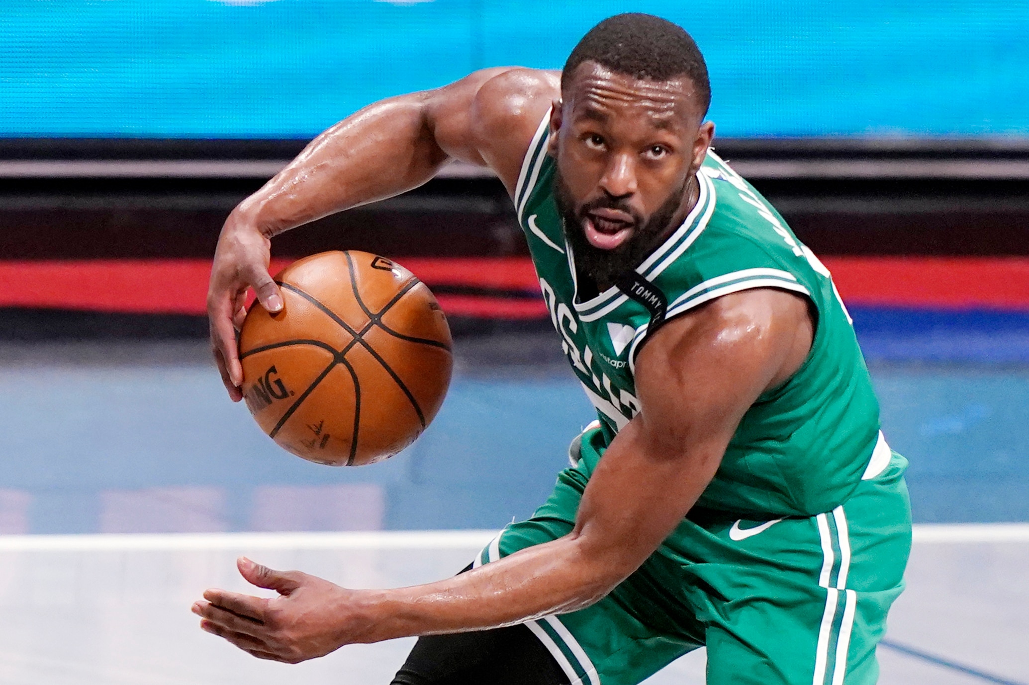 FILE - In this May 25, 2021, file photo, Boston Celtics guard Kemba Walker (8) looks for an outlet during the first quarter of Game 2 of an NBA basketball first-round playoff series against the Brooklyn Nets in New York. The Celtics traded Walker to Oklahoma City for forward Al Horford, a person with knowledge of the deal told The Associated Press on Friday, June 18, 2021. (AP Photo/Kathy Willens, File)