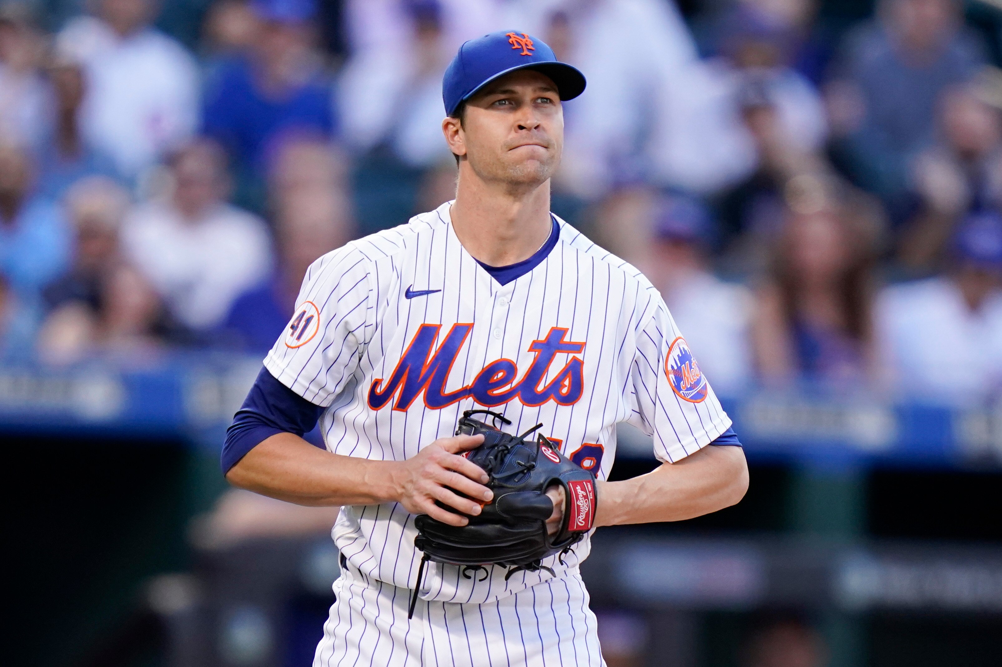 New York Mets starting pitcher Jacob deGrom reacts during the first inning of a baseball game against the Chicago Cubs Wednesday, June 16, 2021, in New York. (AP Photo/Frank Franklin II)