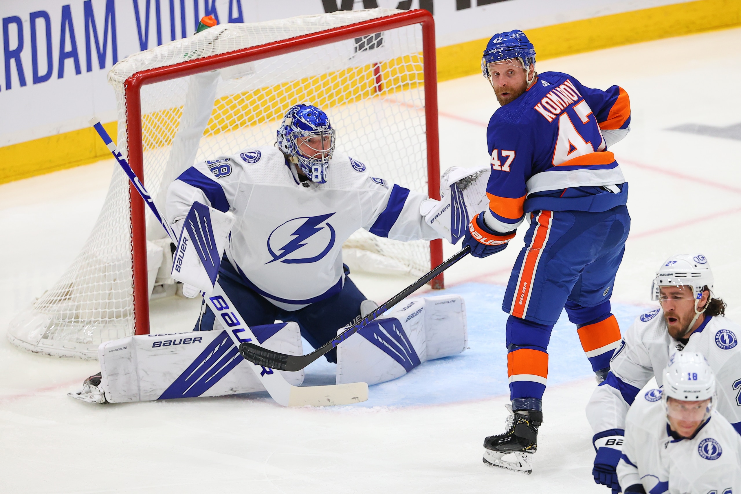 UNIONDALE, NY - JUNE 17:  New York Islanders right wing Leo Komarov (47) in front of Tampa Bay Lightning goaltender Andrei Vasilevskiy (88) during the second period of  the National Hockey League Stanley Cup Playoff Semifinal game between the New York Islanders and the Tampa Bay Lightning ijnJune 17,2021 at Nassau Veterans Memorial Coliseum in Uniondale,NY.  (Photo by Rich Graessle/Icon Sportswire via Getty Images)