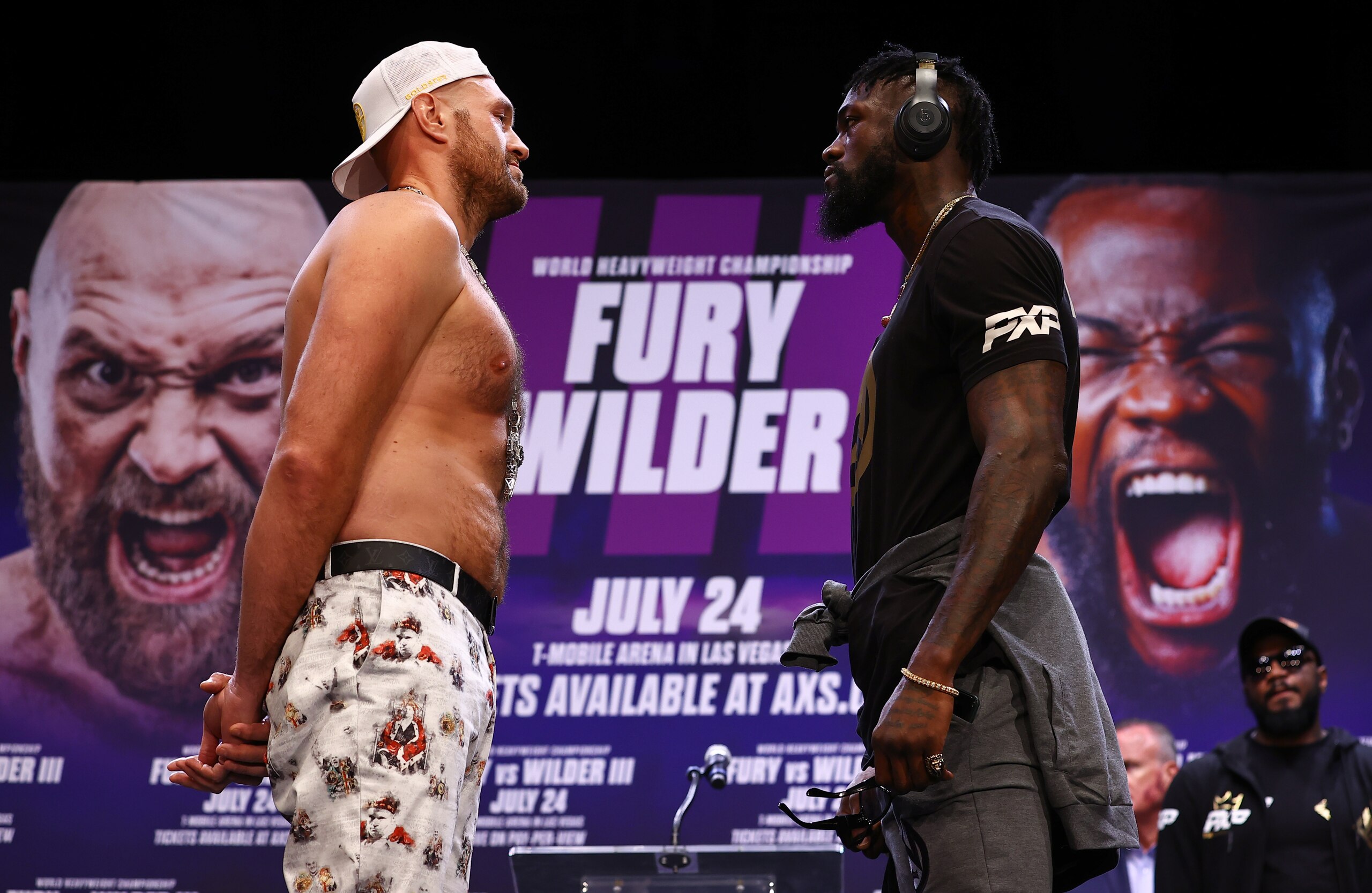 LOS ANGELES, CA - JUNE 15: WBC Heavyweight Champion Tyson Fury (L) and Deontay Wilder (R) face-off during the press conference for the WBC heavyweight championship at The Novo by Microsoft at L.A. Live on June 15, 2021 in Los Angeles, California. (Photo by Mikey Williams/Top Rank Inc/Getty Images)
