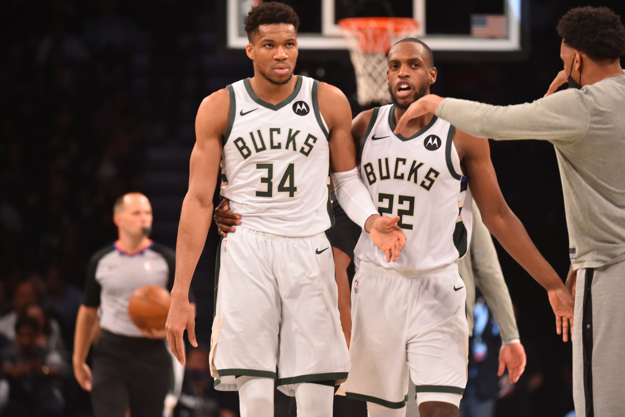 BROOKLYN, NY - JUNE 19: Giannis Antetokounmpo #34 of the Milwaukee Bucks and Khris Middleton #22 of the Milwaukee Bucks talk during Round 2, Game 7 on June 19, 2021 at Barclays Center in Brooklyn, New York. NOTE TO USER: User expressly acknowledges and agrees that, by downloading and/or using this Photograph, user is consenting to the terms and conditions of the Getty Images License Agreement. Mandatory Copyright Notice: Copyright 2021 NBAE (Photo by Jesse D. Garrabrant/NBAE via Getty Images)