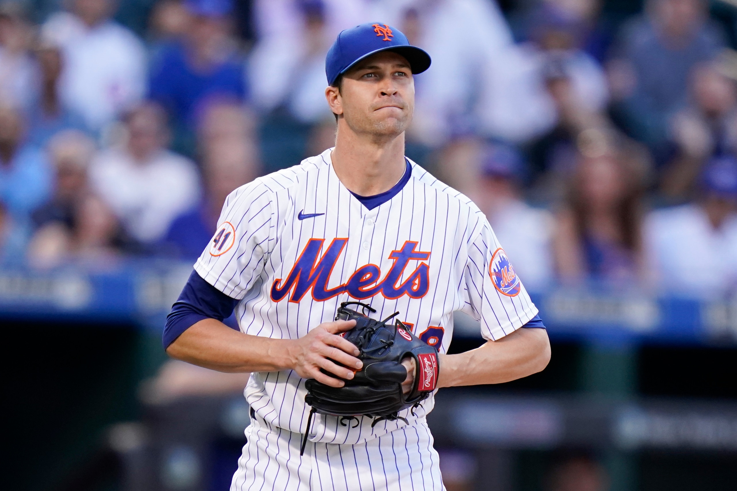 New York Mets starting pitcher Jacob deGrom reacts during the first inning of a baseball game against the Chicago Cubs Wednesday, June 16, 2021, in New York. (AP Photo/Frank Franklin II)