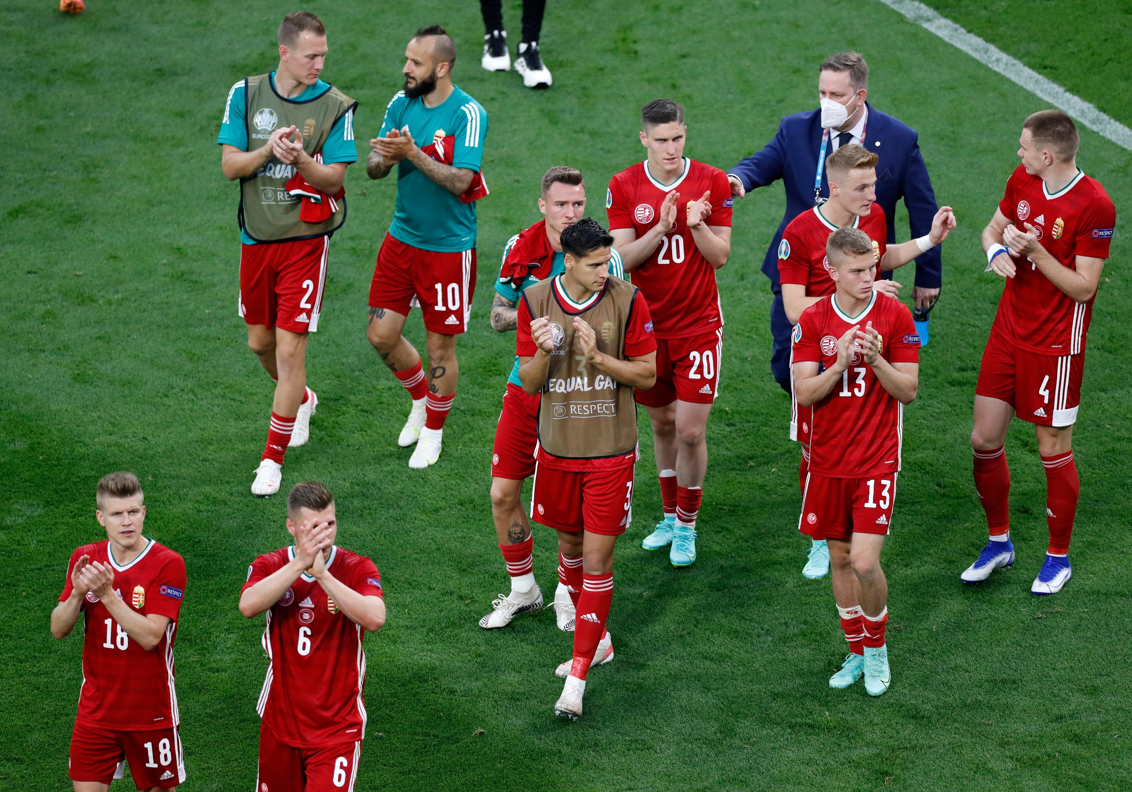 Players of Hungary applaud their fans after the Euro 2020 soccer championship group F match between Hungary and Portugal at the Ferenc Puskas stadium in Budapest, Hungary, Tuesday, June 15, 2021. Portugal won 3-0. (AP Photo/Laszlo Balogh, Pool) Players of Hungary applaud their fans after the Euro 2020 soccer championship group F match between Hungary and Portugal at the Ferenc Puskas stadium in Budapest, Hungary, Tuesday, June 15, 2021. Portugal won 3-0. (AP Photo/Laszlo Balogh, Pool)