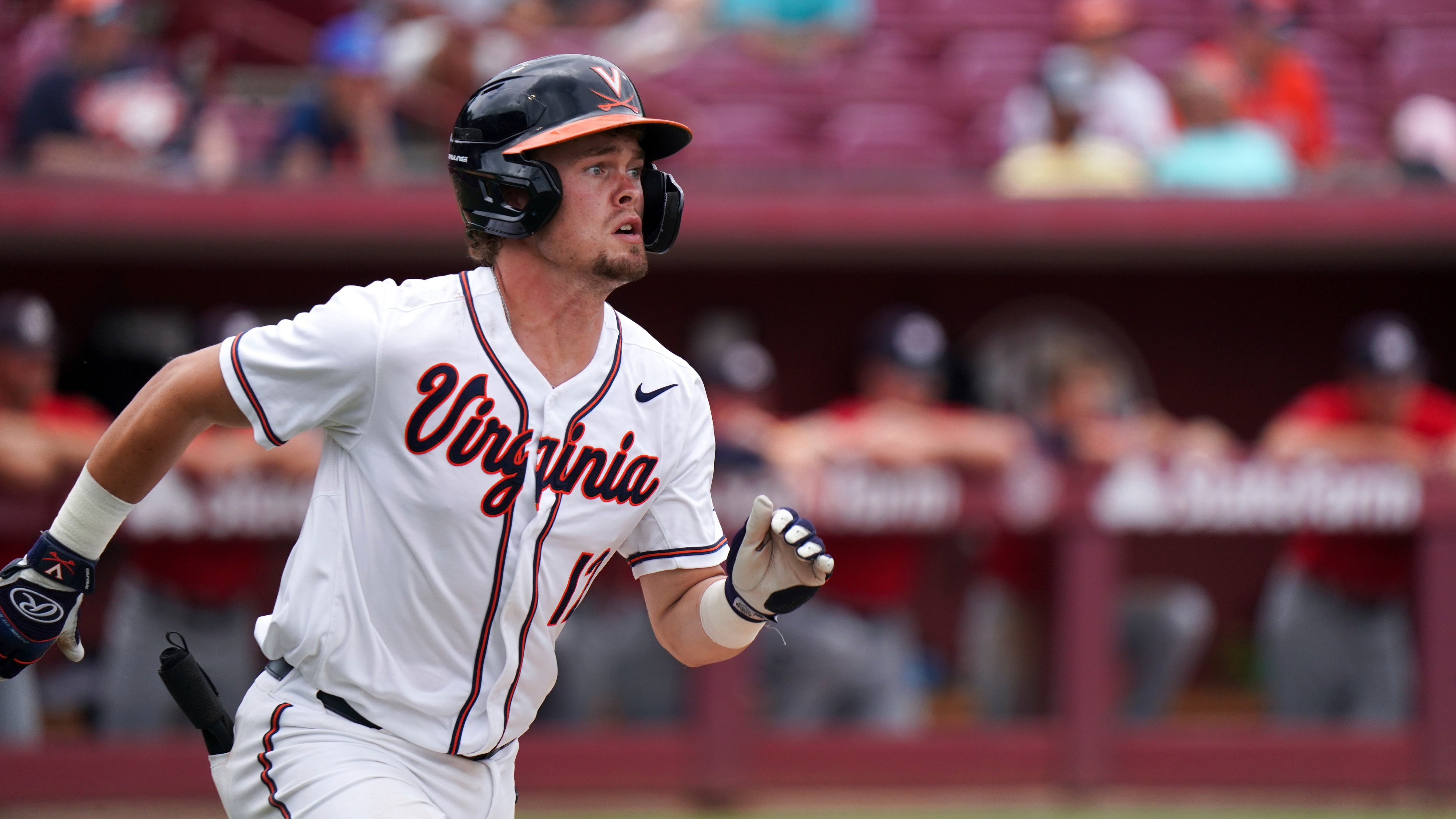 Virginia's Logan Michaels runs to first in the third inning during an NCAA college baseball tournament super regional game against Dallas Baptist Sunday, June 13, 2021, in Columbia, S.C. Virginia won 4-0. (AP Photo/Sean Rayford)