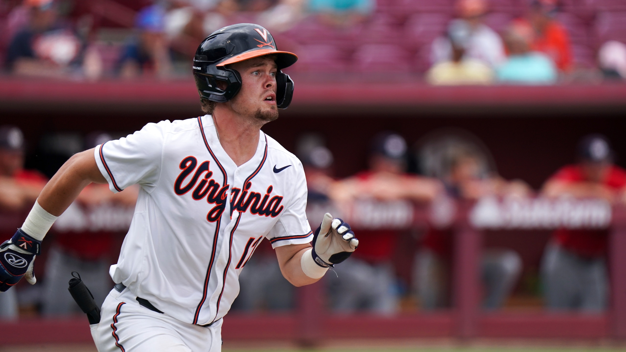 Virginia's Logan Michaels runs to first in the third inning during an NCAA college baseball tournament super regional game against Dallas Baptist Sunday, June 13, 2021, in Columbia, S.C. Virginia won 4-0. (AP Photo/Sean Rayford)