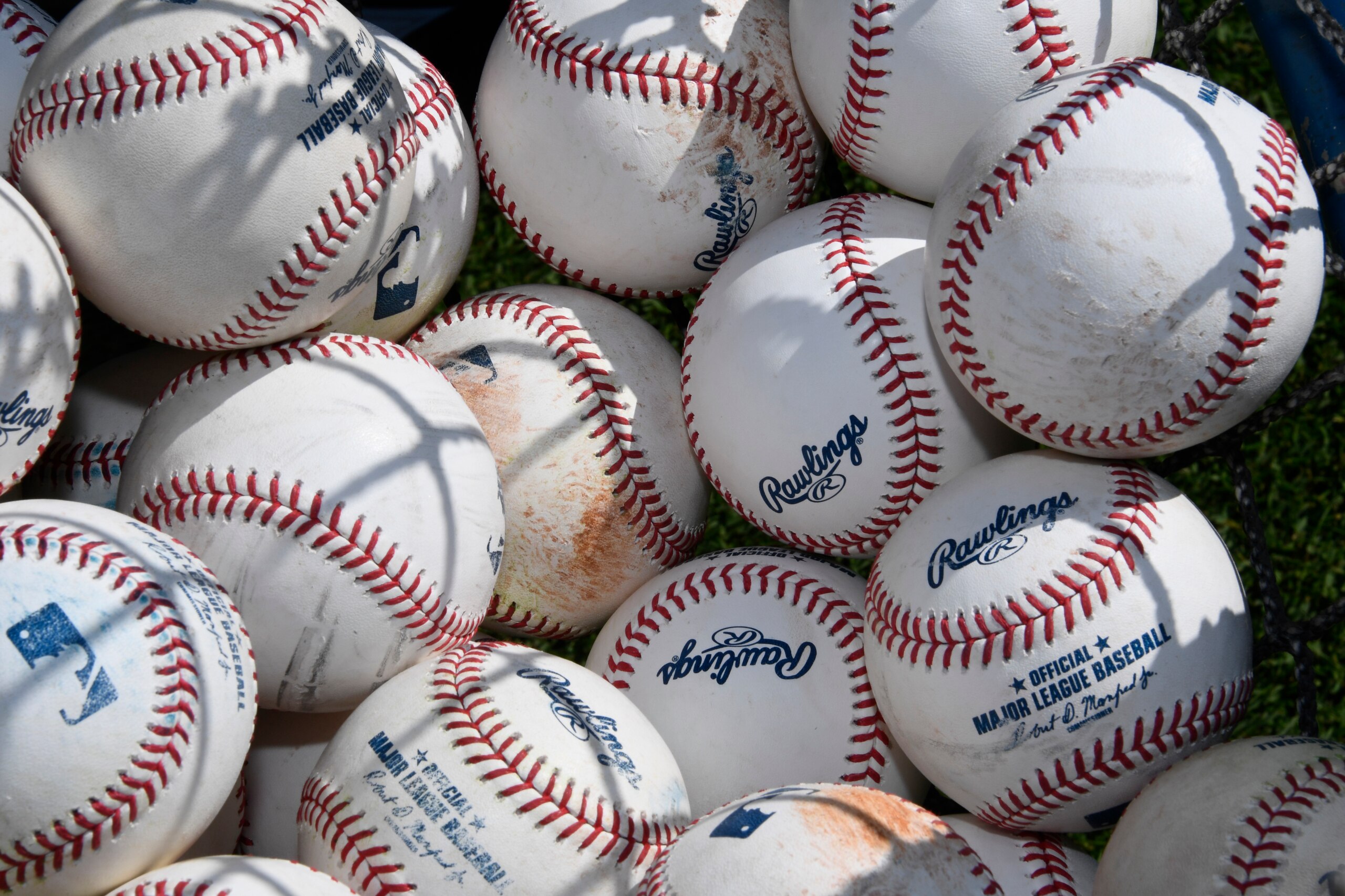 Major League baseballs sit on the field ahead of Game 2 of a best-of-five National League Division Series between the Atlanta Braves and the St. Louis Cardinals, Friday, Oct. 4, 2019, in Atlanta. (AP Photo/Scott Cunningham)