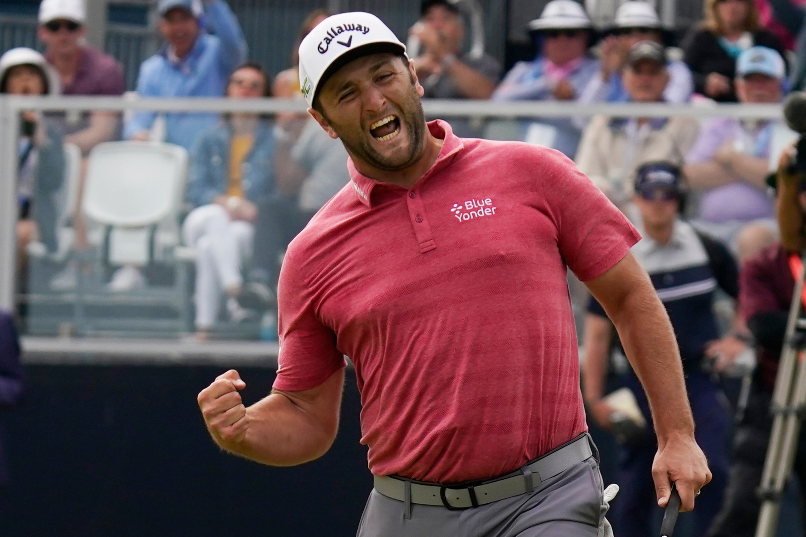 Jon Rahm, of Spain, reacts to making his birdie putt on the 18th green during the final round of the U.S. Open Golf Championship, Sunday, June 20, 2021, at Torrey Pines Golf Course in San Diego. (AP Photo/Gregory Bull)