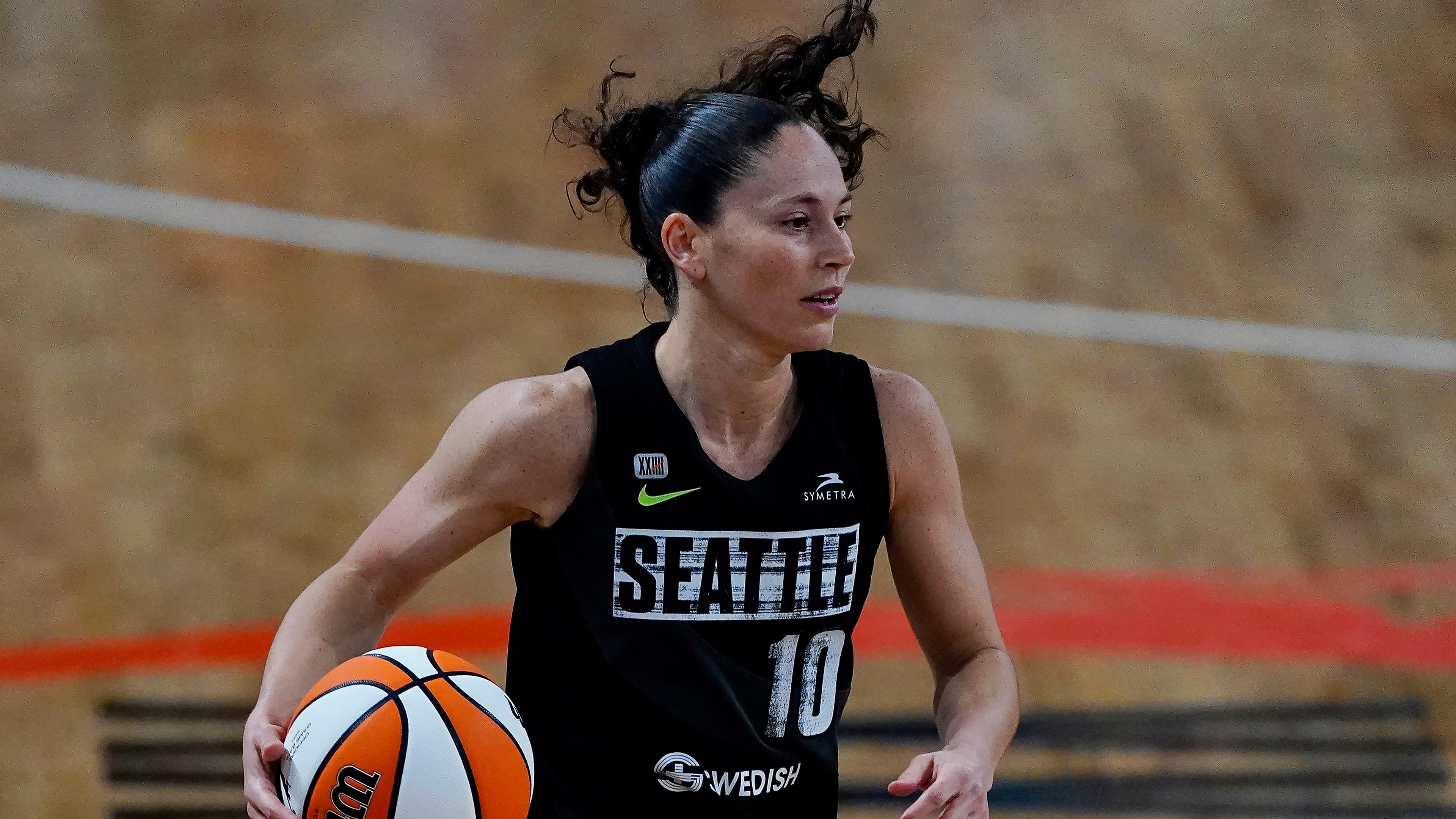 Seattle Storm guard Sue Bird (10) ripples down court against the Atlanta Dream during the first half of their WNBA basketball game Wednesday, June 9, 2021, in College Park, Ga. (AP Photo/John Bazemore)