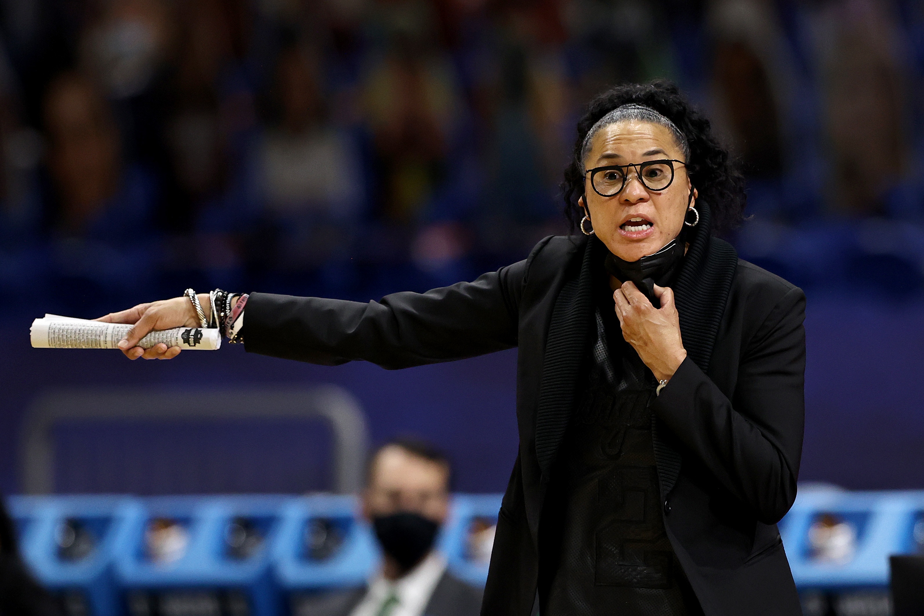 SAN ANTONIO, TEXAS - APRIL 02: Head coach Dawn Staley of the South Carolina Gamecocks calls out to players against the Stanford Cardinal during the third quarter in the Final Four semifinal game of the 2021 NCAA Women's Basketball Tournament at the Alamodome on April 02, 2021 in San Antonio, Texas. (Photo by Elsa/Getty Images)