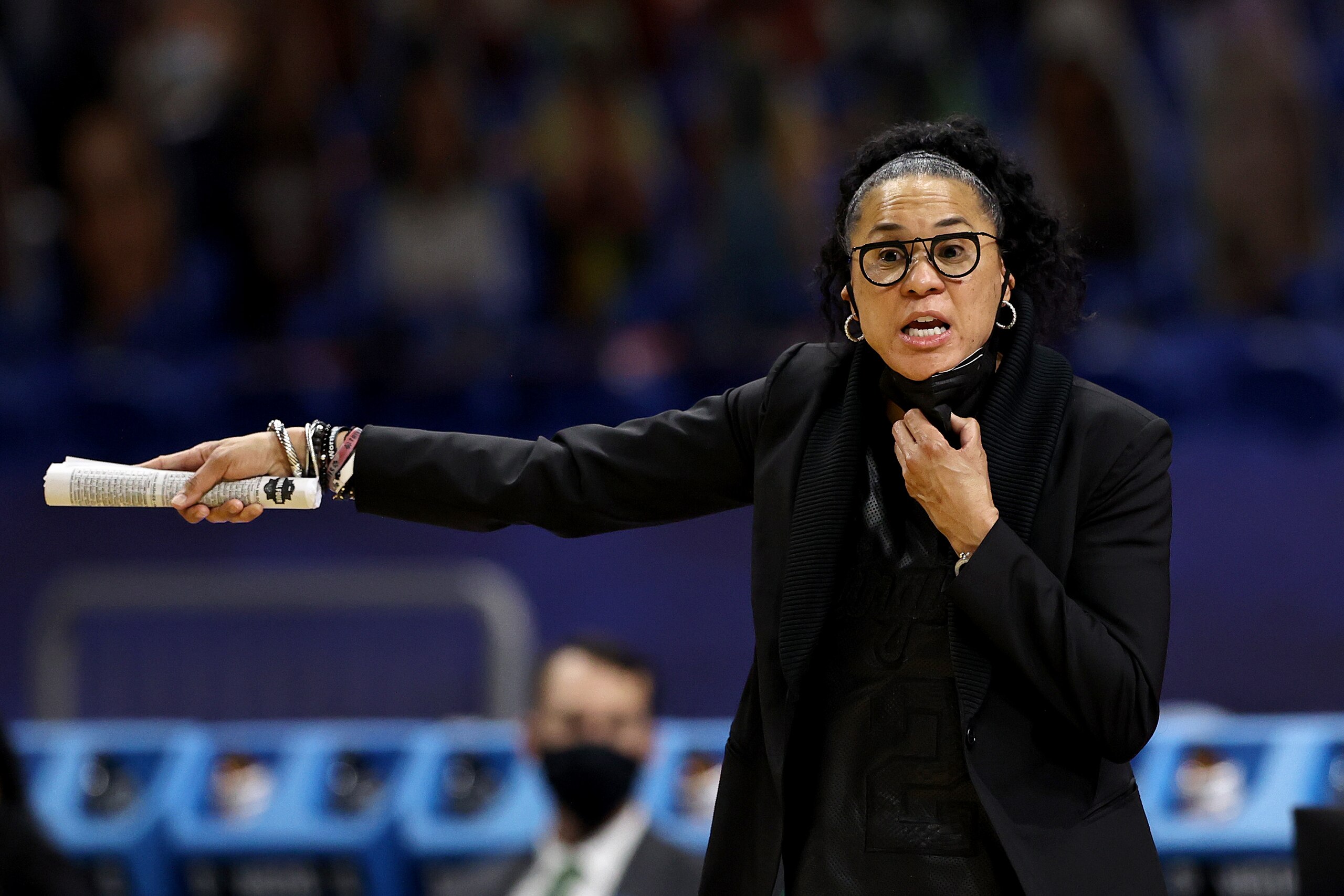 SAN ANTONIO, TEXAS - APRIL 02: Head coach Dawn Staley of the South Carolina Gamecocks calls out to players against the Stanford Cardinal during the third quarter in the Final Four semifinal game of the 2021 NCAA Women's Basketball Tournament at the Alamodome on April 02, 2021 in San Antonio, Texas. (Photo by Elsa/Getty Images) SAN ANTONIO, TEXAS - APRIL 02: Head coach Dawn Staley of the South Carolina Gamecocks calls out to players against the Stanford Cardinal during the third quarter in the Final Four semifinal game of the 2021 NCAA Women's Basketball Tournament at the Alamodome on April 02, 2021 in San Antonio, Texas. (Photo by Elsa/Getty Images)