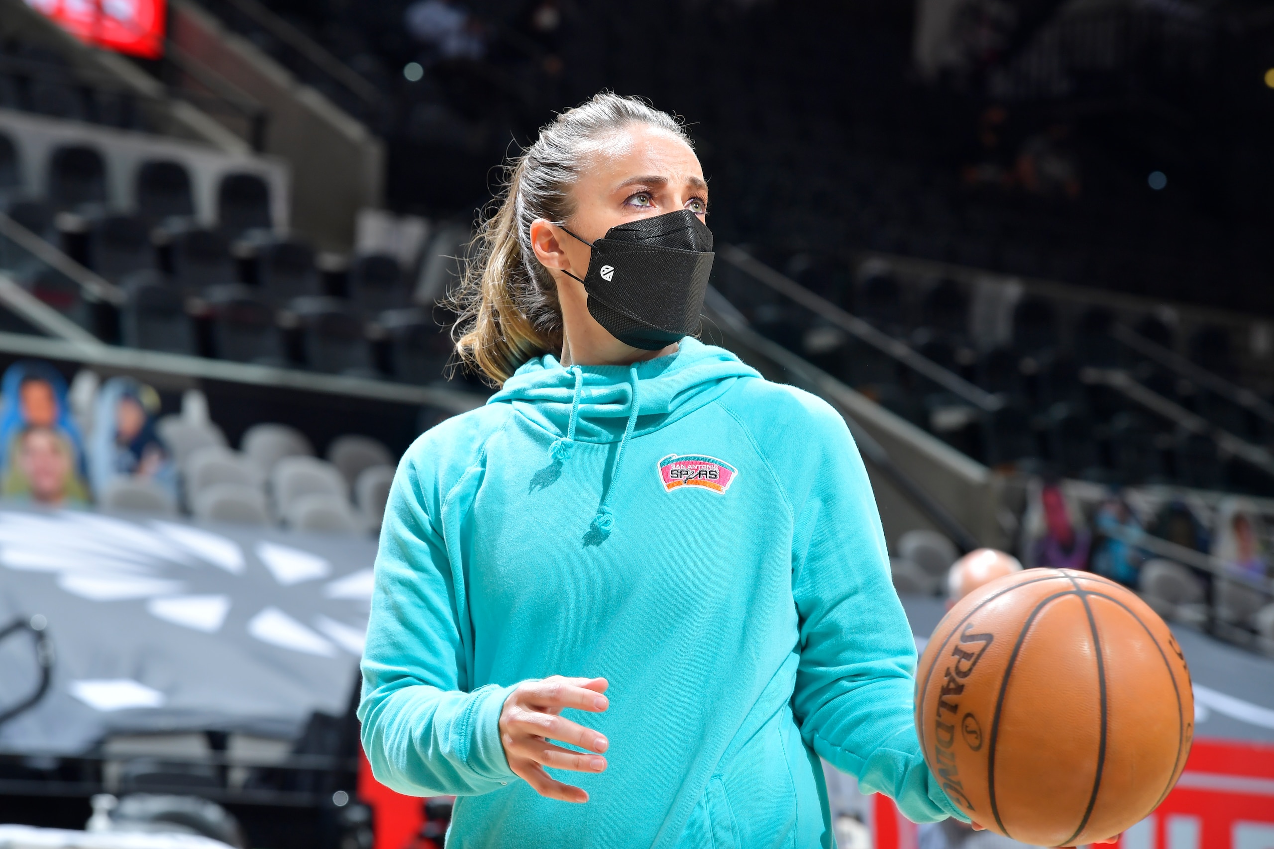 SAN ANTONIO, TX - APRIL 16: Assistant Coach, Becky Hammon of the San Antonio Spurs looks on before the game against the Portland Trail Blazers on April 16, 2021 at the AT&T Center in San Antonio, Texas. NOTE TO USER: User expressly acknowledges and agrees that, by downloading and or using this photograph, user is consenting to the terms and conditions of the Getty Images License Agreement. Mandatory Copyright Notice: Copyright 2021 NBAE (Photos by Logan Riely/NBAE via Getty Images)