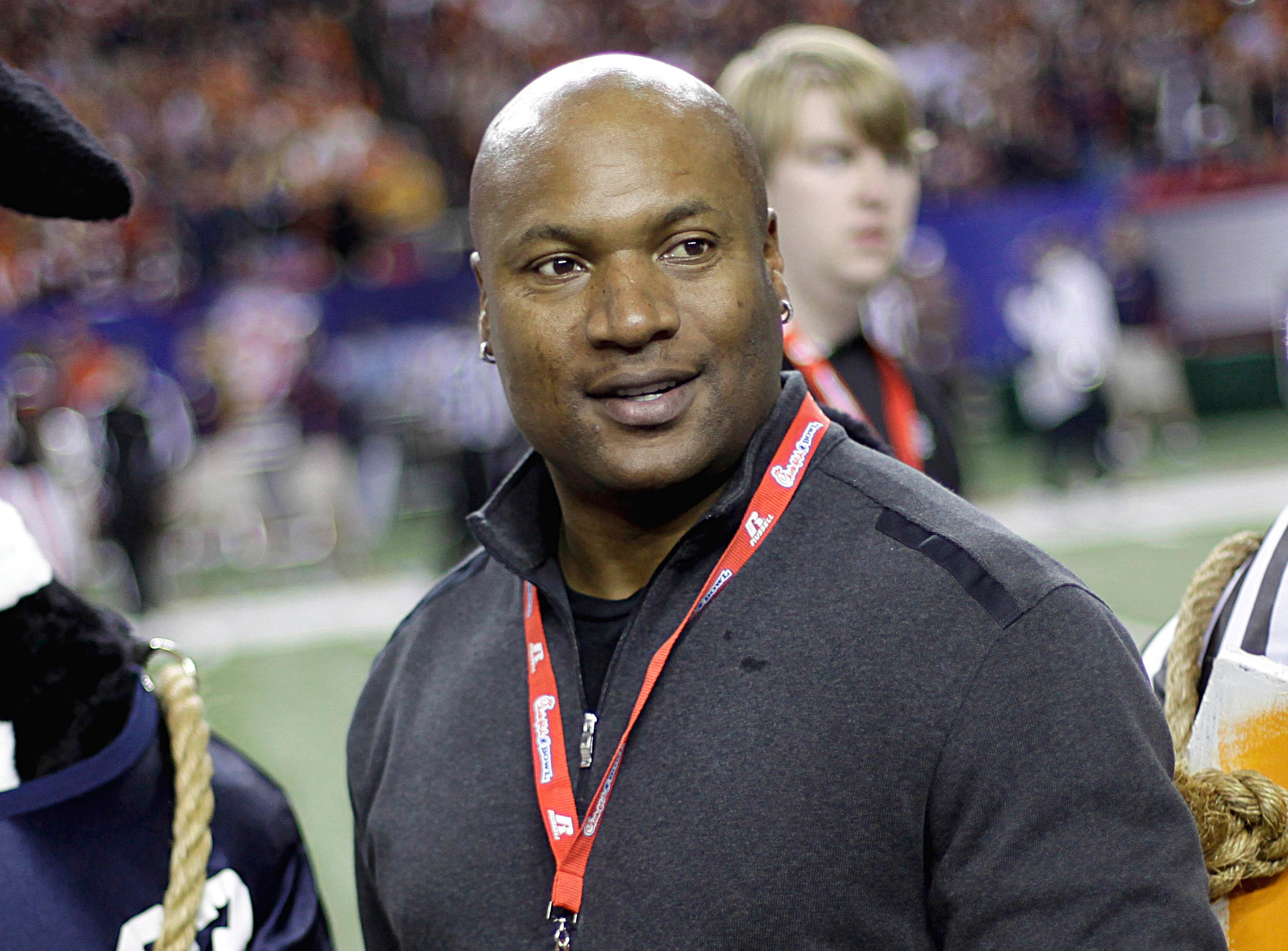 FILE - In this Dec. 31, 2011 file photo, former Auburn player Bo Jackson attends the Chick-fil-A Bowl NCAA college football game between Auburn and Virginia in Atlanta.   Jackson will be honored at the 2013 MLB Beacon Awards Luncheon next month. Major League Baseball announced Thursday, July 25, 2013 that Aretha Franklin and Jackson will receive awards Aug. 24 at the Chicago Marriott Magnificent Mile before the annual Civil Rights Game. The game will be played between the Chicago White Sox and the Texas Rangers at the U.S. Cellular Field. (AP Photo/David Goldman, File)