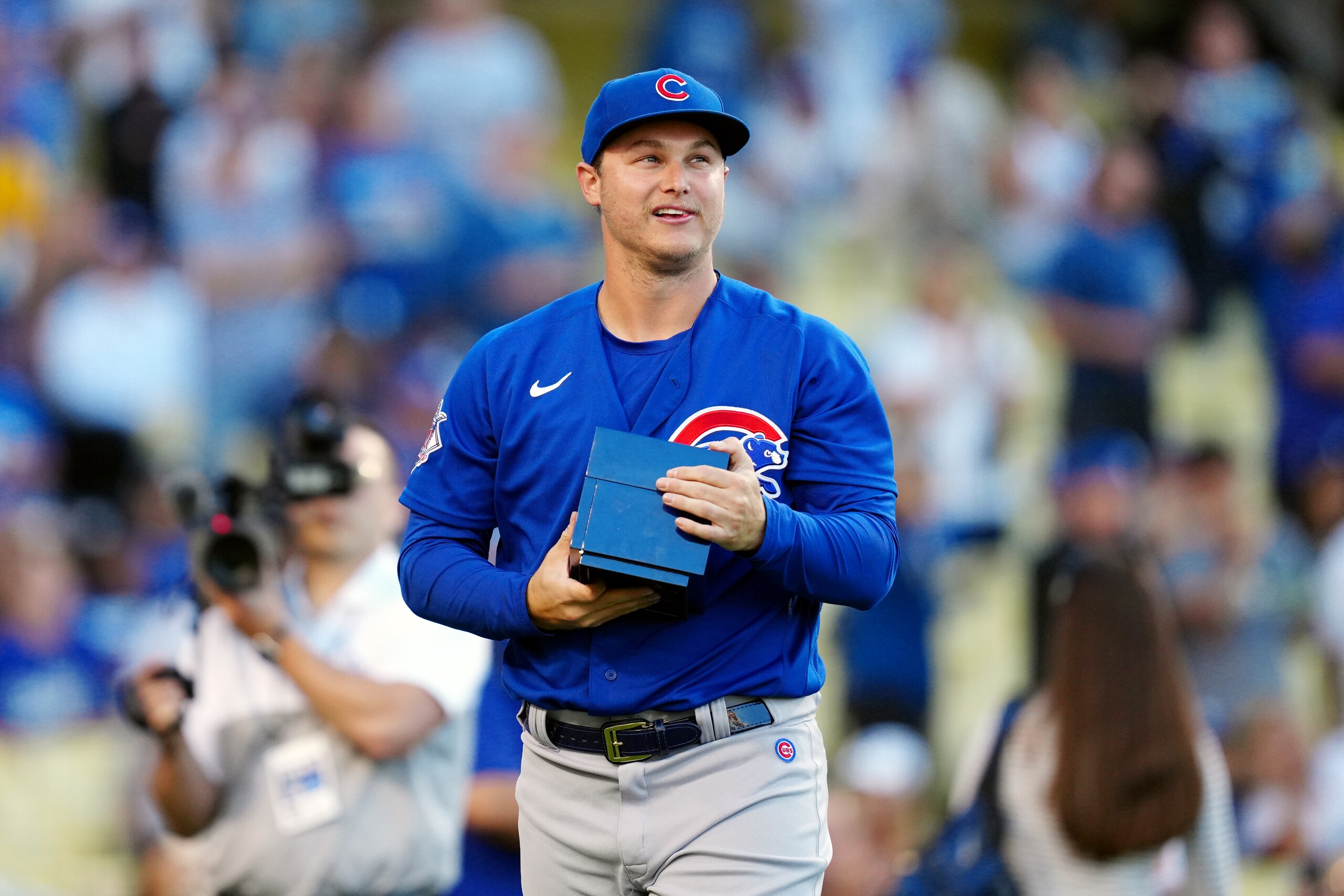 LOS ANGELES, CA - JUNE 24:  Joc Pederson #24 of the Chicago Cubs being presented with a 2020 World Series  before the game between the Chicago Cubs and the Los Angeles Dodgers at Dodgers Stadium on Thursday, June 24, 2021 in Los Angeles, California. (Photo by Daniel Shirey/MLB Photos via Getty Images)