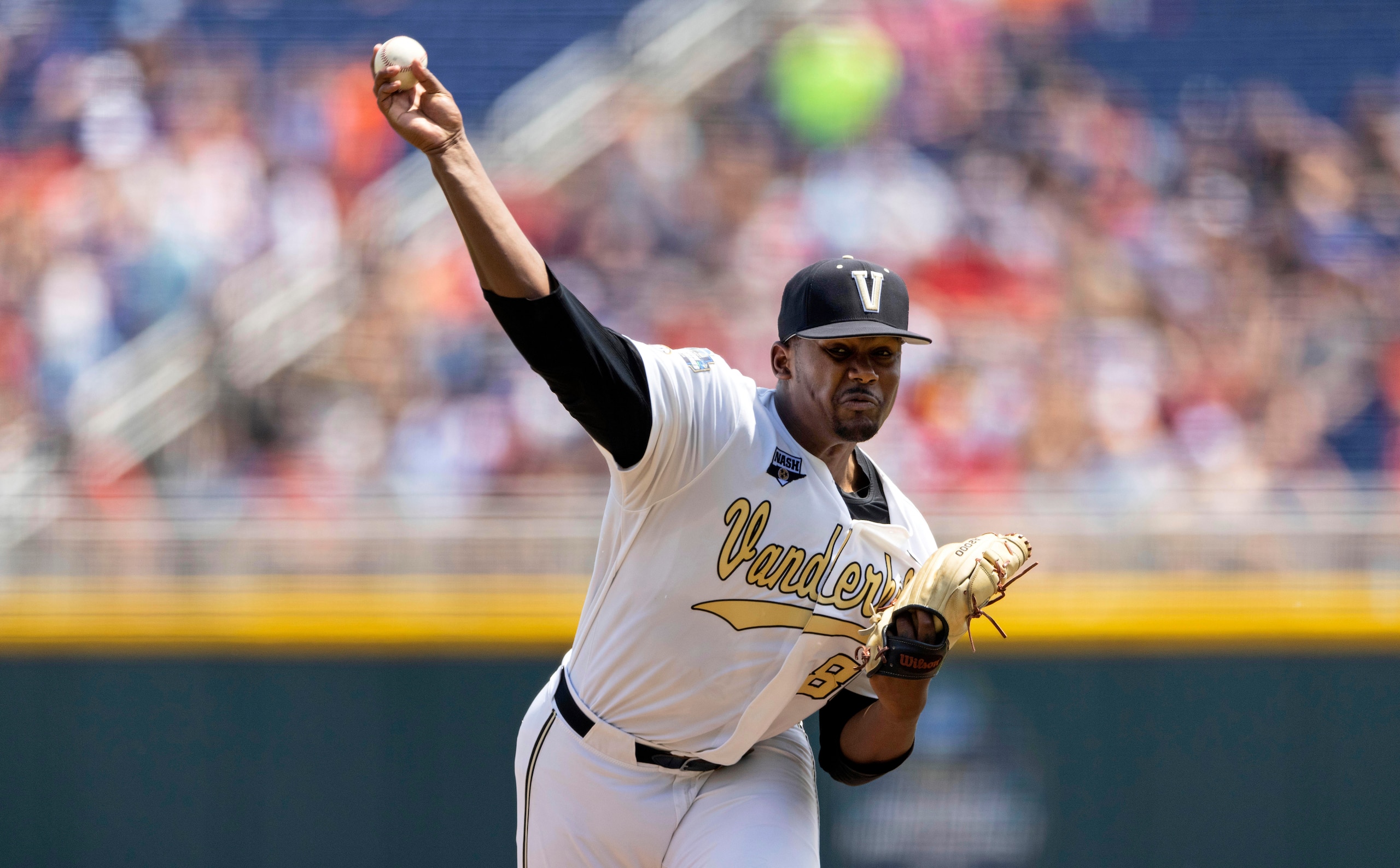 Vanderbilt starting pitcher Kumar Rocker (80) throws against North Carolina State in the first inning of a baseball game at the College World Series, Friday, June 25, 2021, at TD Ameritrade Park in Omaha, Neb. (AP Photo/Rebecca S. Gratz)