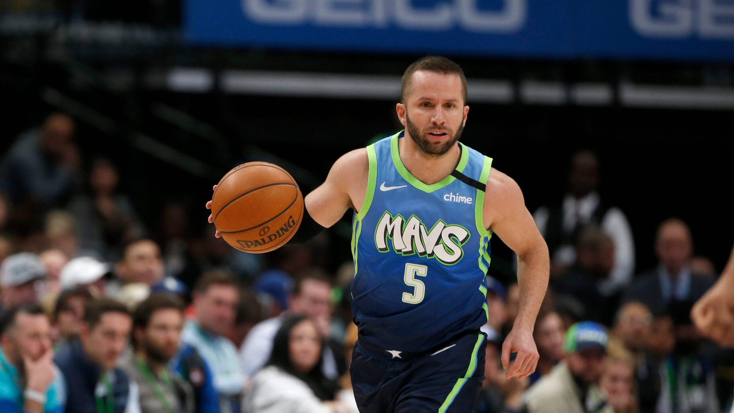 Dallas Mavericks guard J.J. Barea (5) moves the ball up the court against the Utah Jazz during the first half an NBA basketball game in Dallas, Monday, Feb. 10, 2020. (AP Photo/Michael Ainsworth)