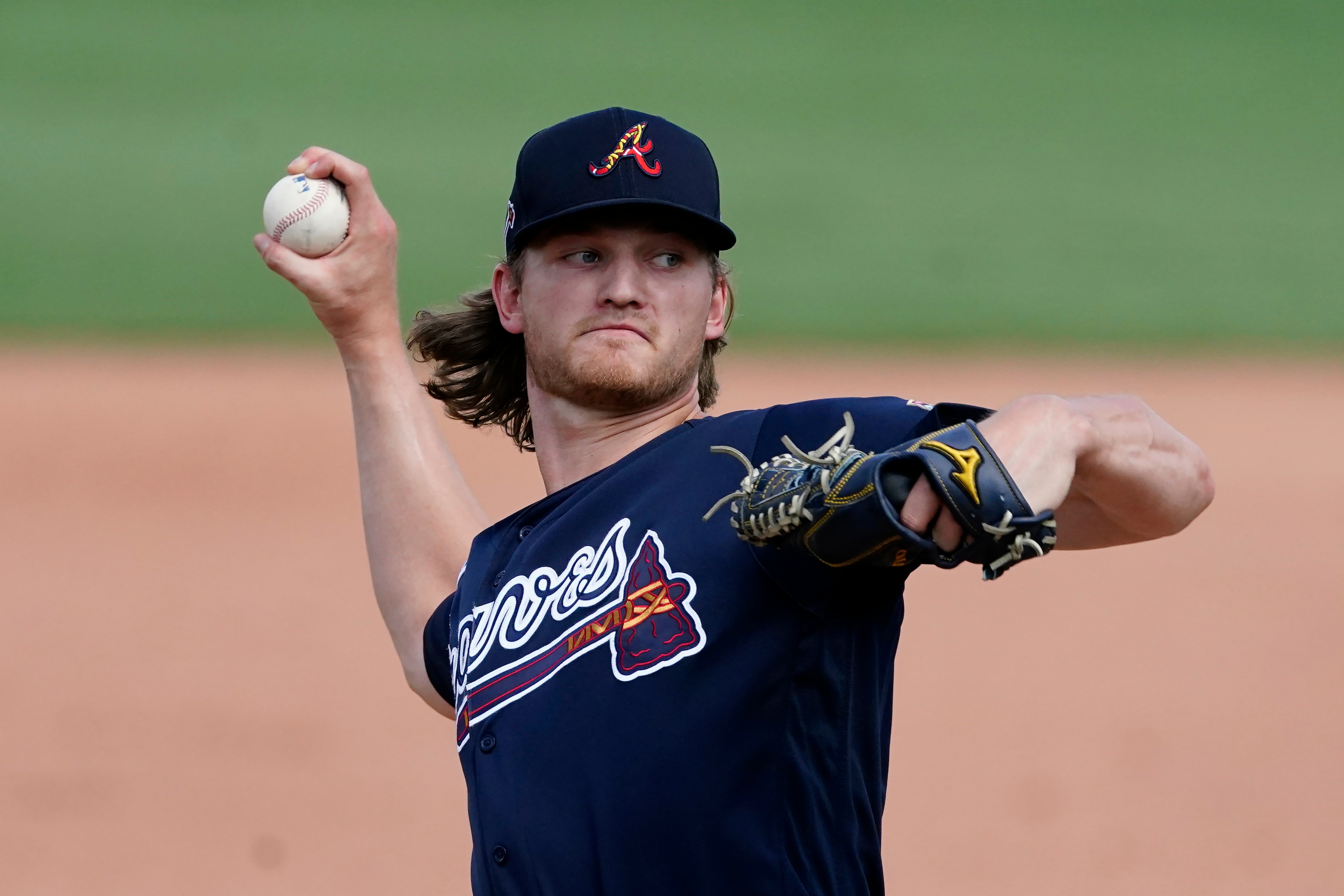 FILE - In this Tuesday, March 30, 2021 file photo, Atlanta Braves starting pitcher Mike Soroka delivers in the sixth inning of a spring training baseball game against the Boston Red Sox in Fort Myers, Fla. Atlanta Braves right-hander Mike Soroka has suffered a setback in his recovery from surgery to repair his torn right Achilles tendon and will have a follow-up surgery next week, threatening his plans to return to the rotation this season. Soroka was the Braves' opening day starter in 2020 before suffering the season-ending injury against the New York Mets on Aug. 3. (AP Photo/John Bazemore, File)