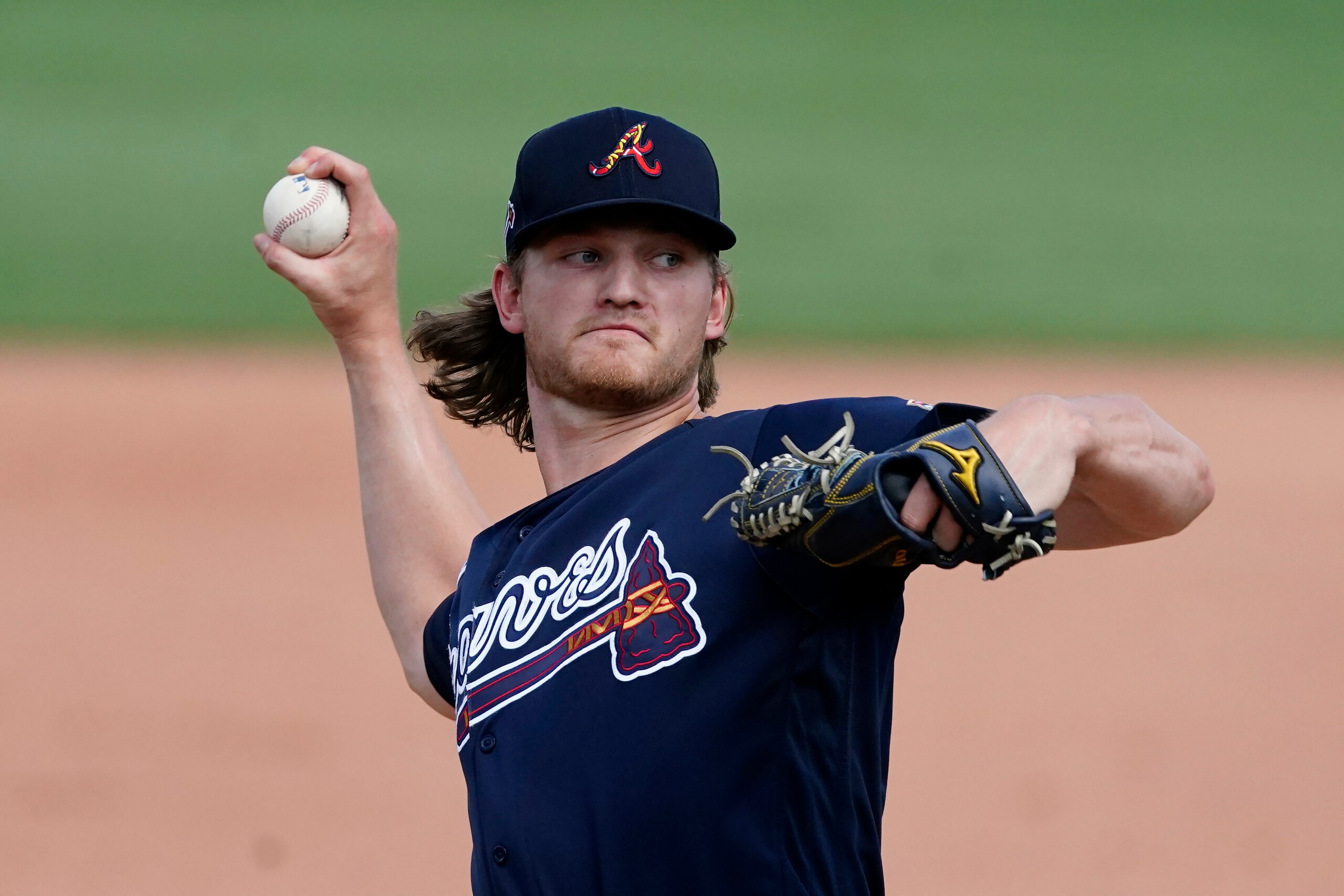 FILE - In this Tuesday, March 30, 2021 file photo, Atlanta Braves starting pitcher Mike Soroka delivers in the sixth inning of a spring training baseball game against the Boston Red Sox in Fort Myers, Fla. Atlanta Braves right-hander Mike Soroka has suffered a setback in his recovery from surgery to repair his torn right Achilles tendon and will have a follow-up surgery next week, threatening his plans to return to the rotation this season. Soroka was the Braves' opening day starter in 2020 before suffering the season-ending injury against the New York Mets on Aug. 3. (AP Photo/John Bazemore, File)