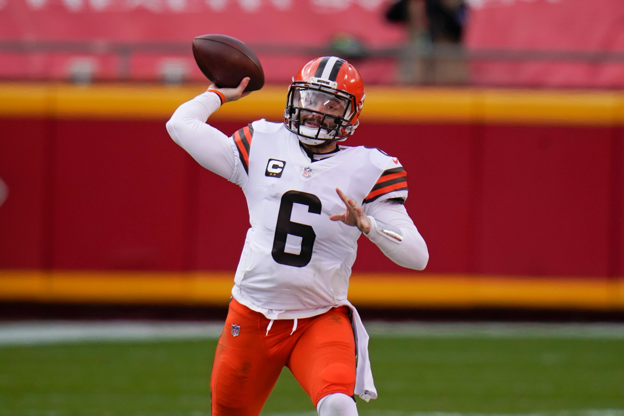 Cleveland Browns quarterback Baker Mayfield (6) throws a pass during the first half of an NFL divisional round football game against the Kansas City Chiefs, Sunday, Jan. 17, 2021, in Kansas City. (AP Photo/Jeff Roberson)