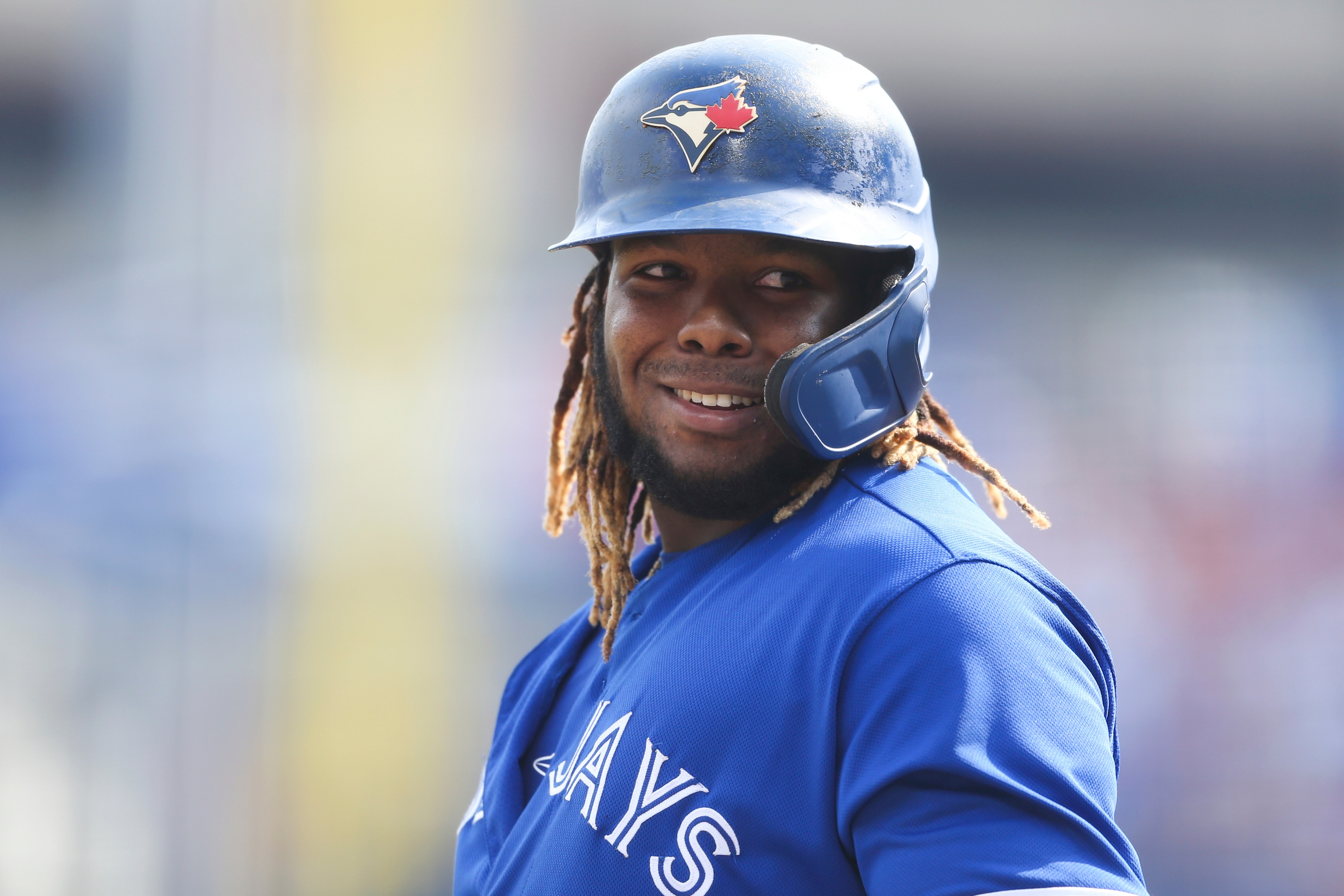 Toronto Blue Jays' Vladimir Guerrero Jr. smiles during an at-bat during the sixth inning of the baseball game against the Baltimore Orioles in Buffalo, N.Y., Saturday, June 26, 2021. (AP Photo/Joshua Bessex)