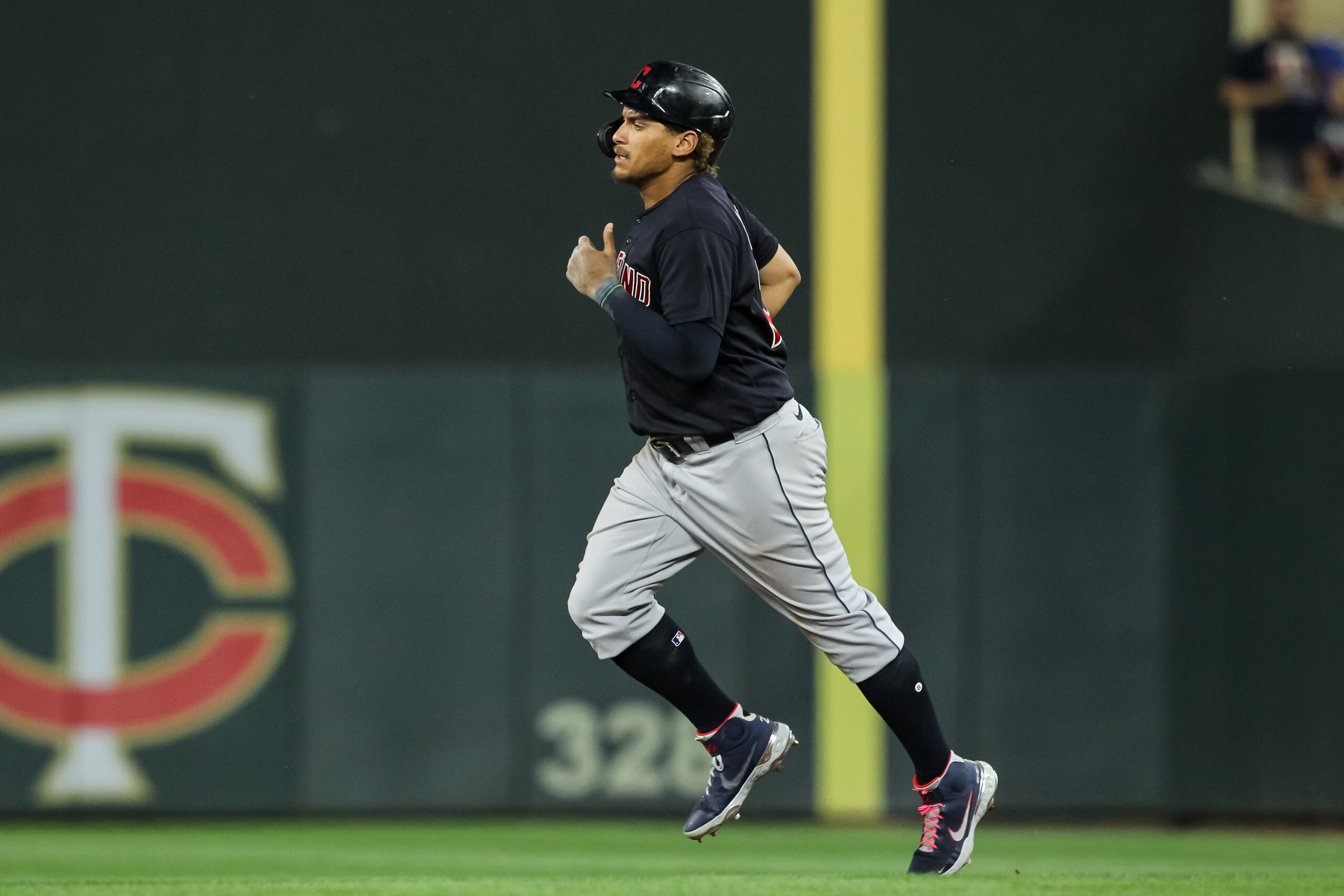 MINNEAPOLIS, MN - JUNE 25: Josh Naylor #22 of the Cleveland Indians rounds the bases after hitting a solo home run against the Minnesota Twins in the ninth inning of the game at Target Field on June 25, 2021 in Minneapolis, Minnesota. The Twins defeated the Indians 8-7. (Photo by David Berding/Getty Images)