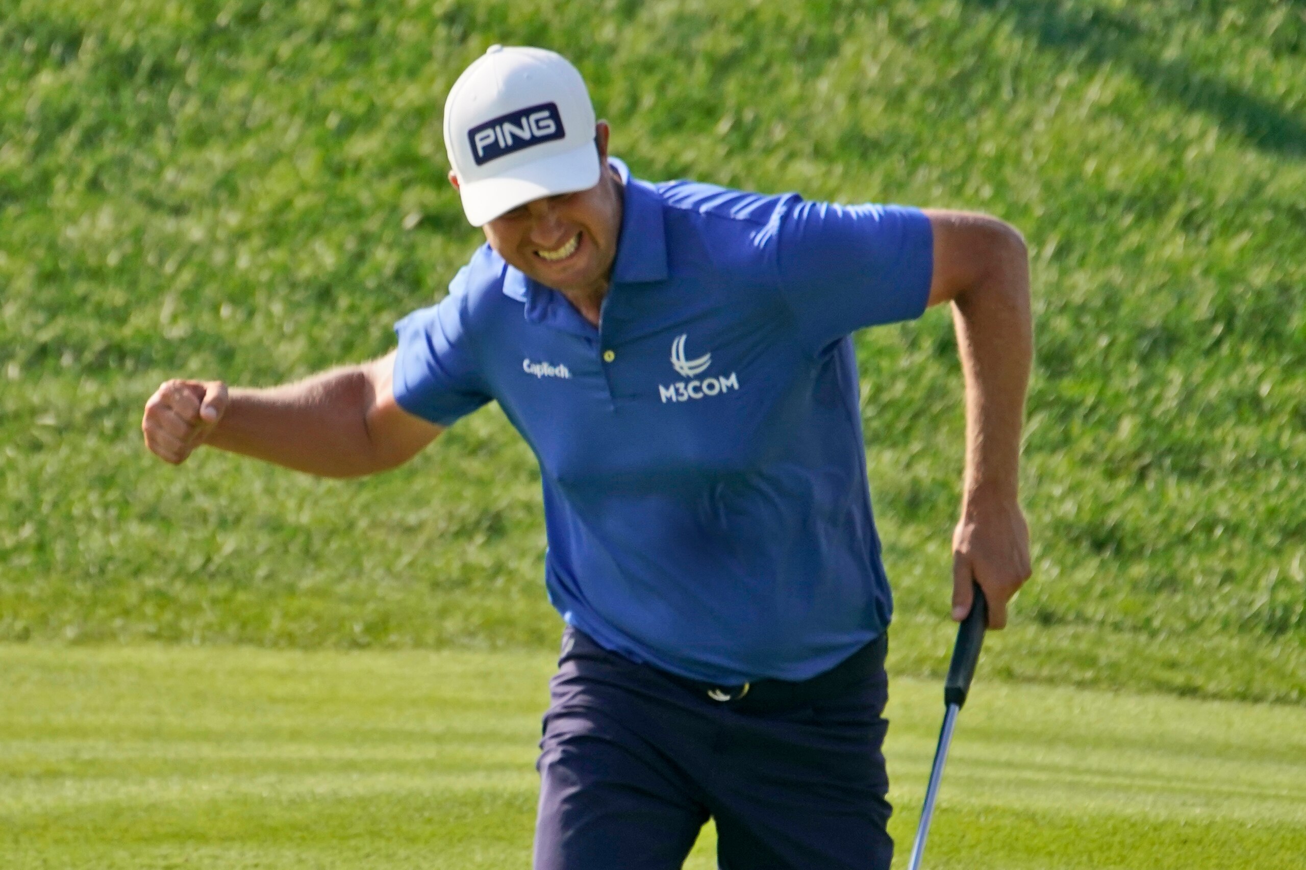 Harris English celebrates a birdie on the 18th green during the final round of the Travelers Championship golf tournament at TPC River Highlands, Sunday, June 27, 2021, in Cromwell, Conn. (AP Photo/John Minchillo)