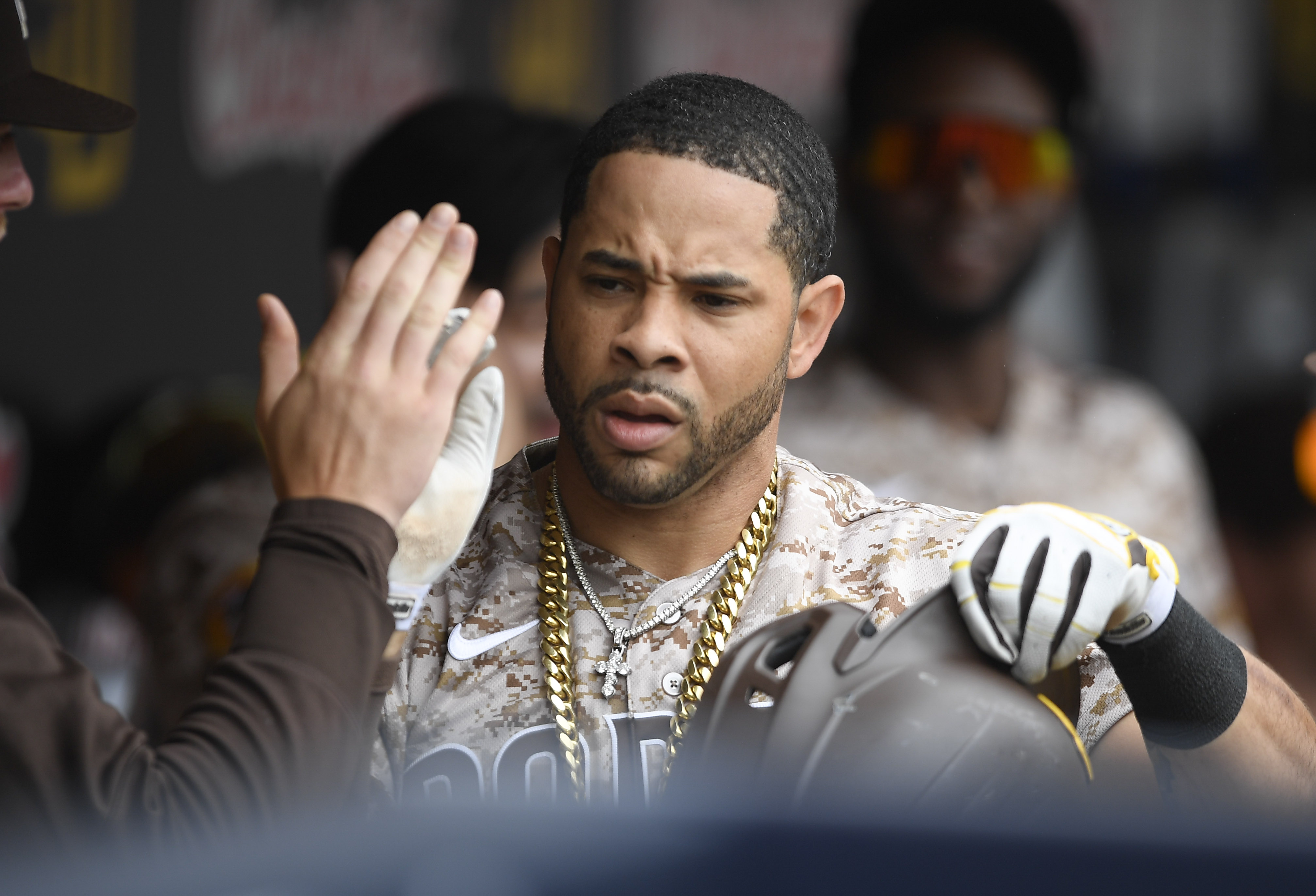 SAN DIEGO, CA - JUNE 27: Tommy Pham #28 of the San Diego Padres is congratulated in the dugout after hitting a solo home run during the first inning of a baseball game against the Arizona Diamondbacks at Petco Park on June 27, 2021 in San Diego, California.  (Photo by Denis Poroy/Getty Images)