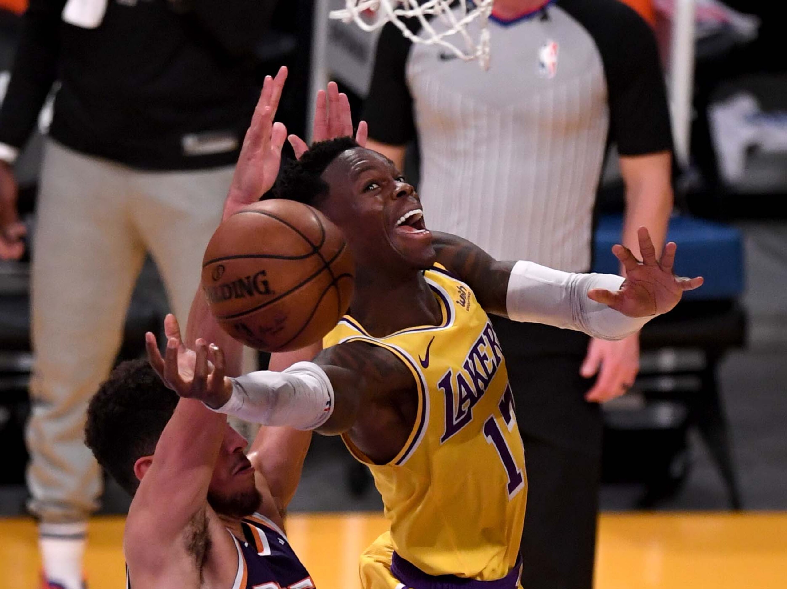 Los Angeles, CA - June 03:  Dennis Schroder #17 of the Los Angeles Lakers drives to the basket against the Phoenix Suns in the first half of game six of the Western Conference First Round NBA Playoff basketball game at the Staples Center in Los Angeles on Thursday, June 3, 2021. (Photo by Keith Birmingham/MediaNews Group/Pasadena Star-News via Getty Images)
