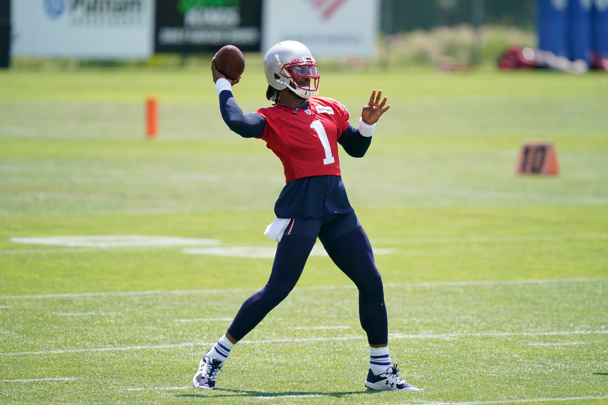 New England Patriots quarterback Cam Newton (1) passes the ball during an NFL football minicamp practice, Wednesday, June 16, 2021, in Foxborough, Mass. (AP Photo/Steven Senne)