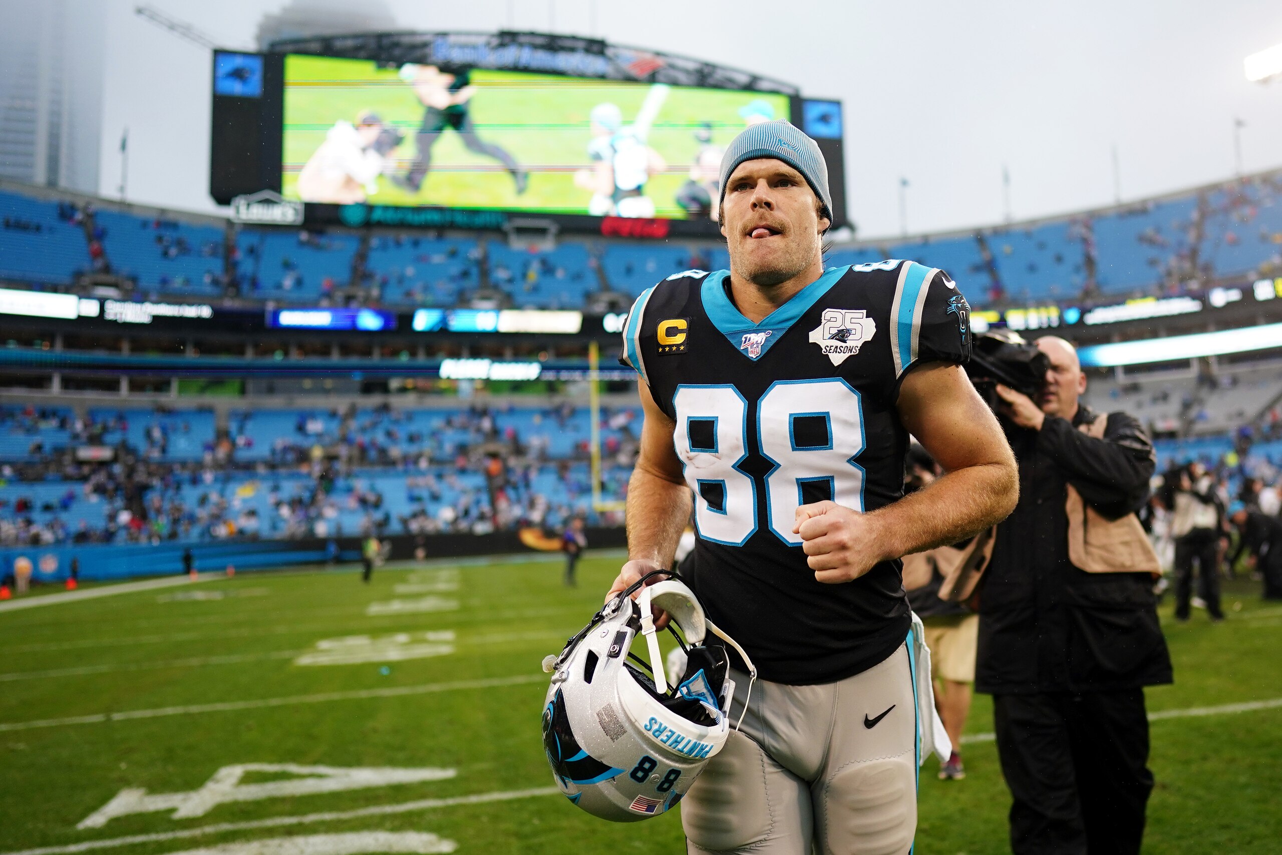 CHARLOTTE, NORTH CAROLINA - DECEMBER 29: Greg Olsen #88 of the Carolina Panthers walks off the field after their game against the New Orleans Saints at Bank of America Stadium on December 29, 2019 in Charlotte, North Carolina. (Photo by Jacob Kupferman/Getty Images)