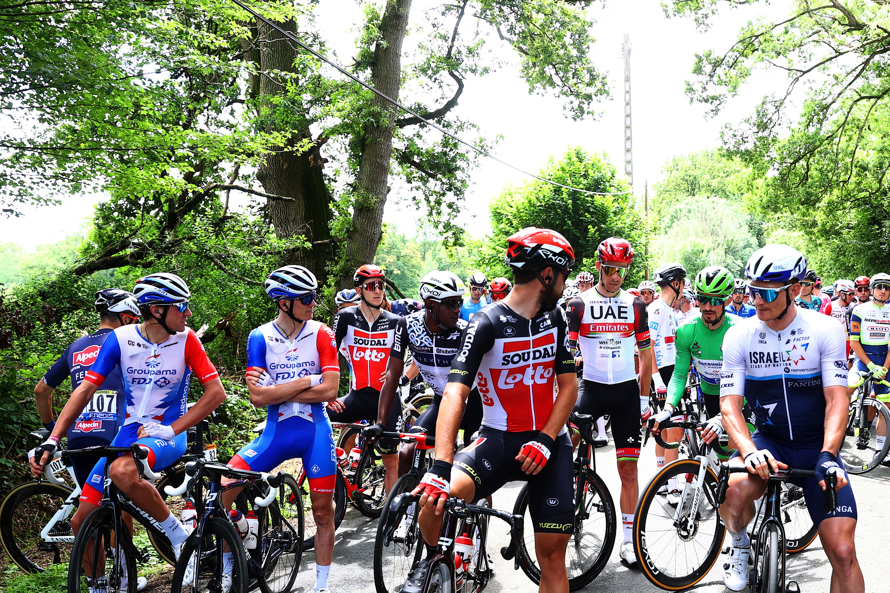 FOUGERES, FRANCE - JUNE 29: Thomas De Gendt of Belgium and Team Lotto Soudal, André Greipel of Germany and Team Israel Start-Up Nation & The peloton protest due to lack of safety and multiple crashes during the 108th Tour de France 2021, Stage 4 a 150,4km stage from Redon to Fougères / @LeTour / #TDF2021 / on June 29, 2021 in Fougeres, France. (Photo by Michael Steele/Getty Images)