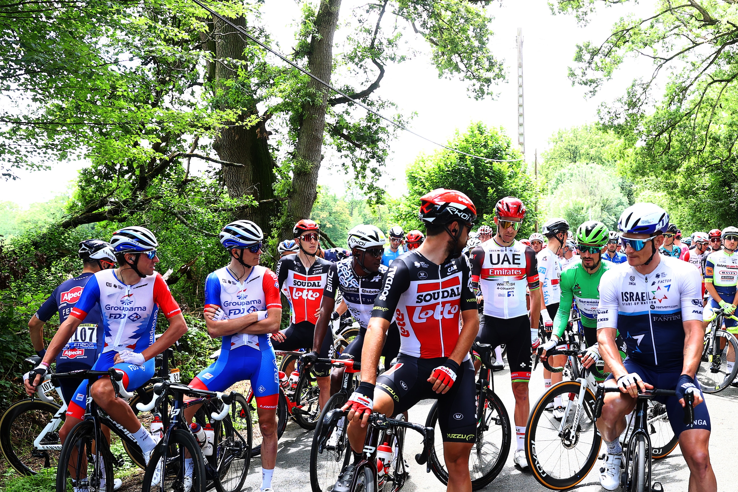 FOUGERES, FRANCE - JUNE 29: Thomas De Gendt of Belgium and Team Lotto Soudal, André Greipel of Germany and Team Israel Start-Up Nation & The peloton protest due to lack of safety and multiple crashes during the 108th Tour de France 2021, Stage 4 a 150,4km stage from Redon to Fougères / @LeTour / #TDF2021 / on June 29, 2021 in Fougeres, France. (Photo by Michael Steele/Getty Images)