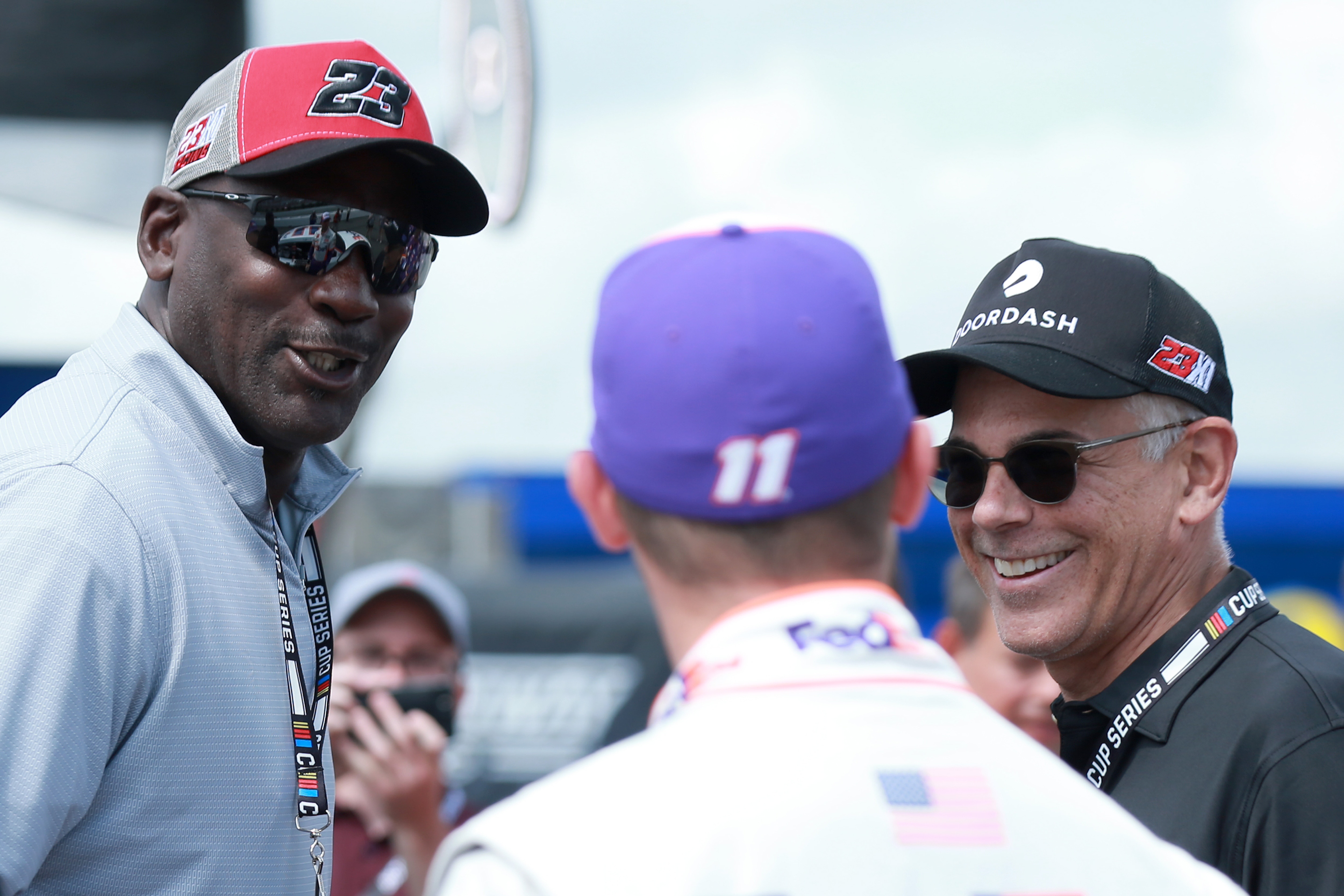 LONG POND, PENNSYLVANIA - JUNE 26: NBA Hall of Famer Michael Jordan meets with co-owner of 23XI Racing Denny Hamlin, driver of the #11 FedEx Ground Toyota, prior to the NASCAR Cup Series Pocono Organics CBD 325 at Pocono Raceway on June 26, 2021 in Long Pond, Pennsylvania. (Photo by Sean Gardner/23XI Racing via Getty Images)