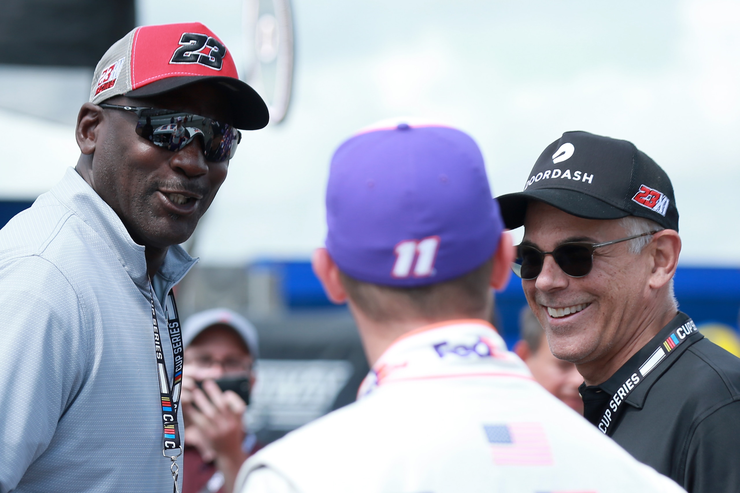 LONG POND, PENNSYLVANIA - JUNE 26: NBA Hall of Famer Michael Jordan meets with co-owner of 23XI Racing Denny Hamlin, driver of the #11 FedEx Ground Toyota, prior to the NASCAR Cup Series Pocono Organics CBD 325 at Pocono Raceway on June 26, 2021 in Long Pond, Pennsylvania. (Photo by Sean Gardner/23XI Racing via Getty Images)