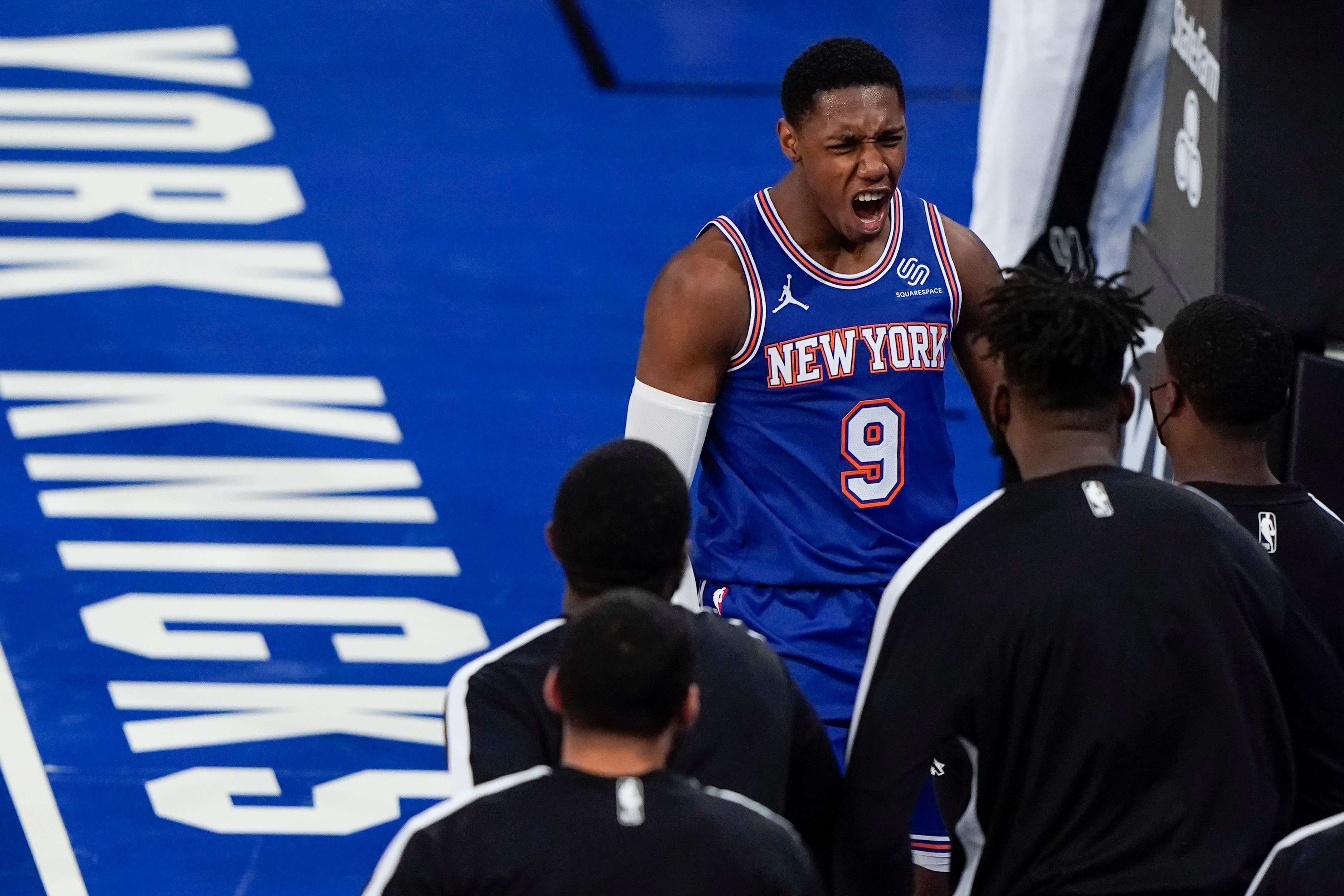 New York Knicks' RJ Barrett (9) celebrates with teammates after scoring during the second half of an NBA basketball game against the San Antonio Spurs Thursday, May 13, 2021, in New York. (AP Photo/Frank Franklin II, Pool)