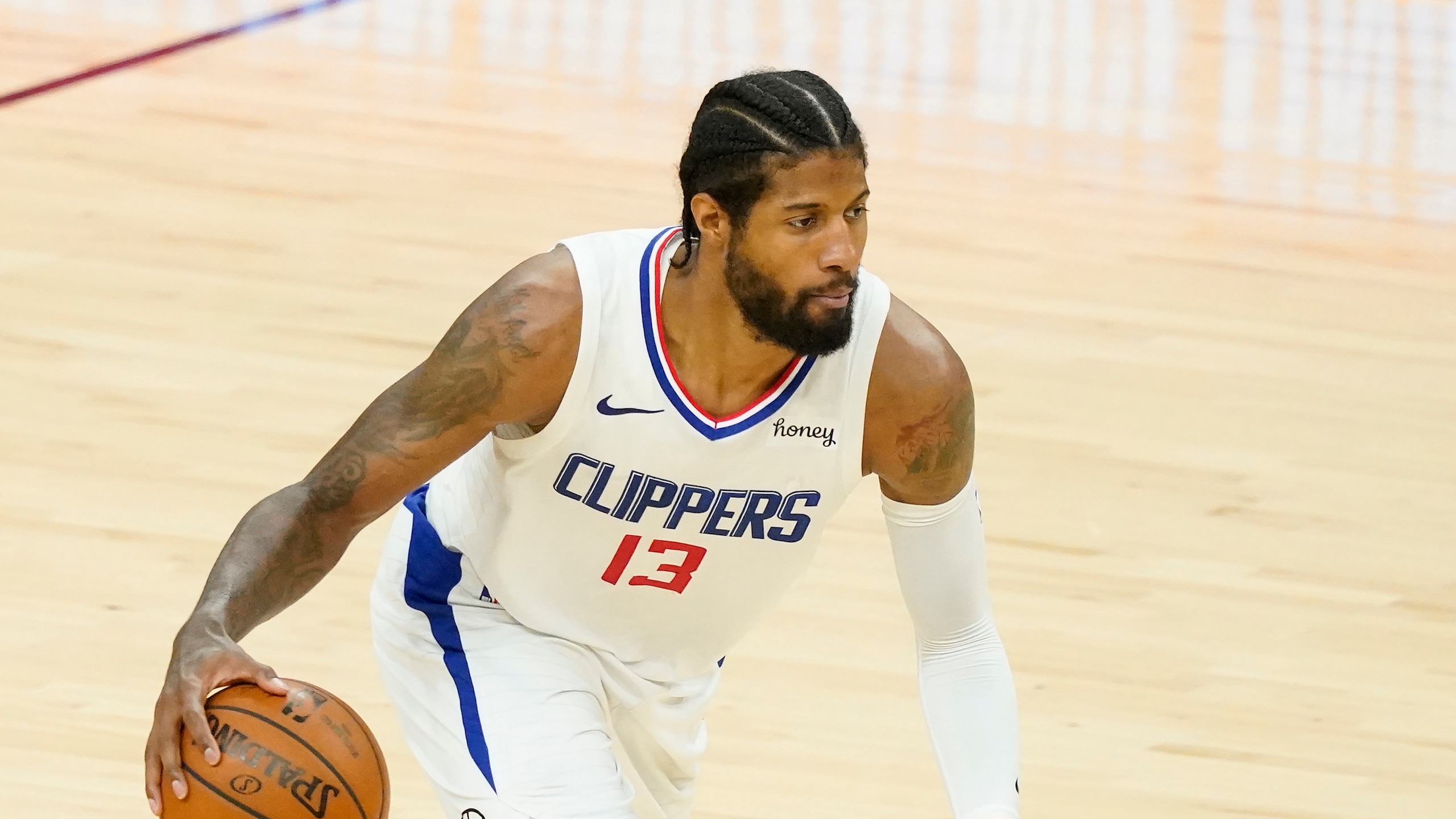 Los Angeles Clippers guard Paul George (13) against the Phoenix Suns during the second half of game 5 of the NBA basketball Western Conference Finals, Monday, June 28, 2021, in Phoenix. (AP Photo/Matt York)