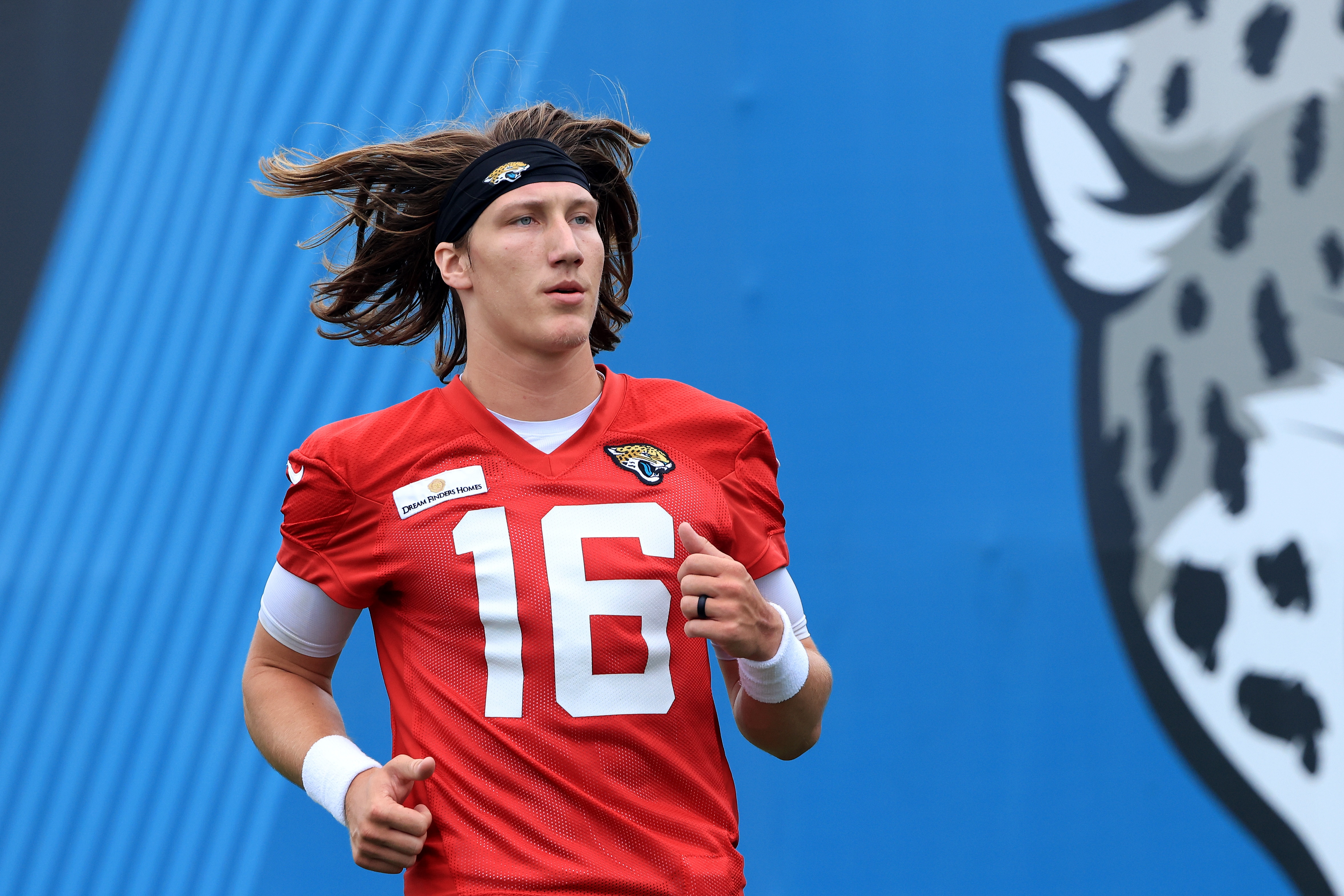 JACKSONVILLE, FLORIDA - JUNE 14: Trevor Lawrence #16 of the Jacksonville Jaguars participates in drills during Jacksonville Jaguars Mandatory Minicamp at TIAA Bank Field on June 14, 2021 in Jacksonville, Florida. (Photo by Sam Greenwood/Getty Images)