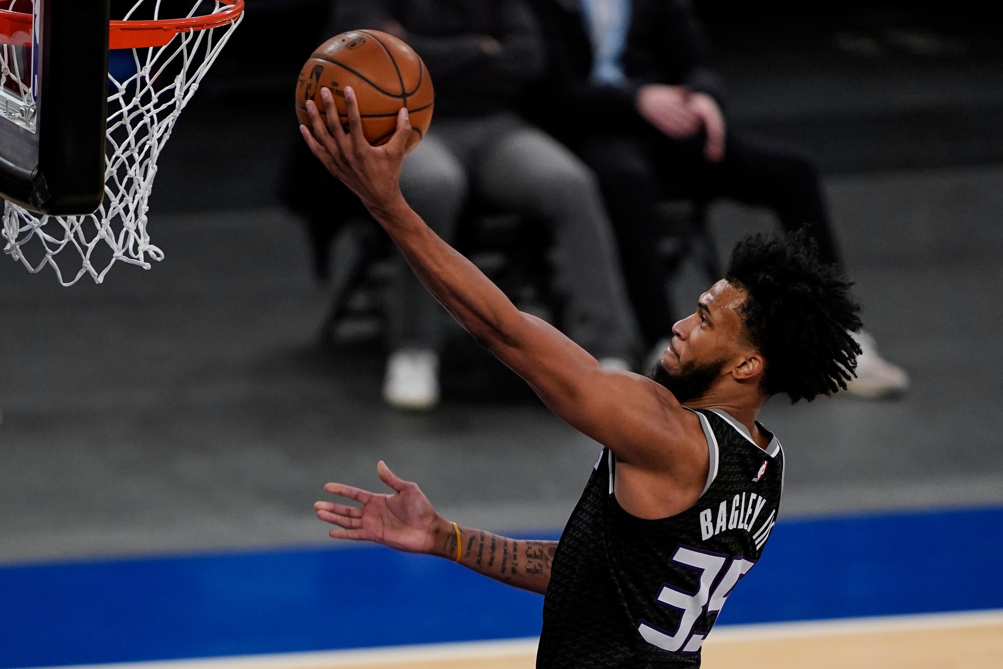 Sacramento Kings forward Marvin Bagley III shoots during the first half of the team's NBA basketball game against the New York Knicks, Thursday, Feb. 25, 2021, in New York. (AP Photo/John Minchillo, Pool)