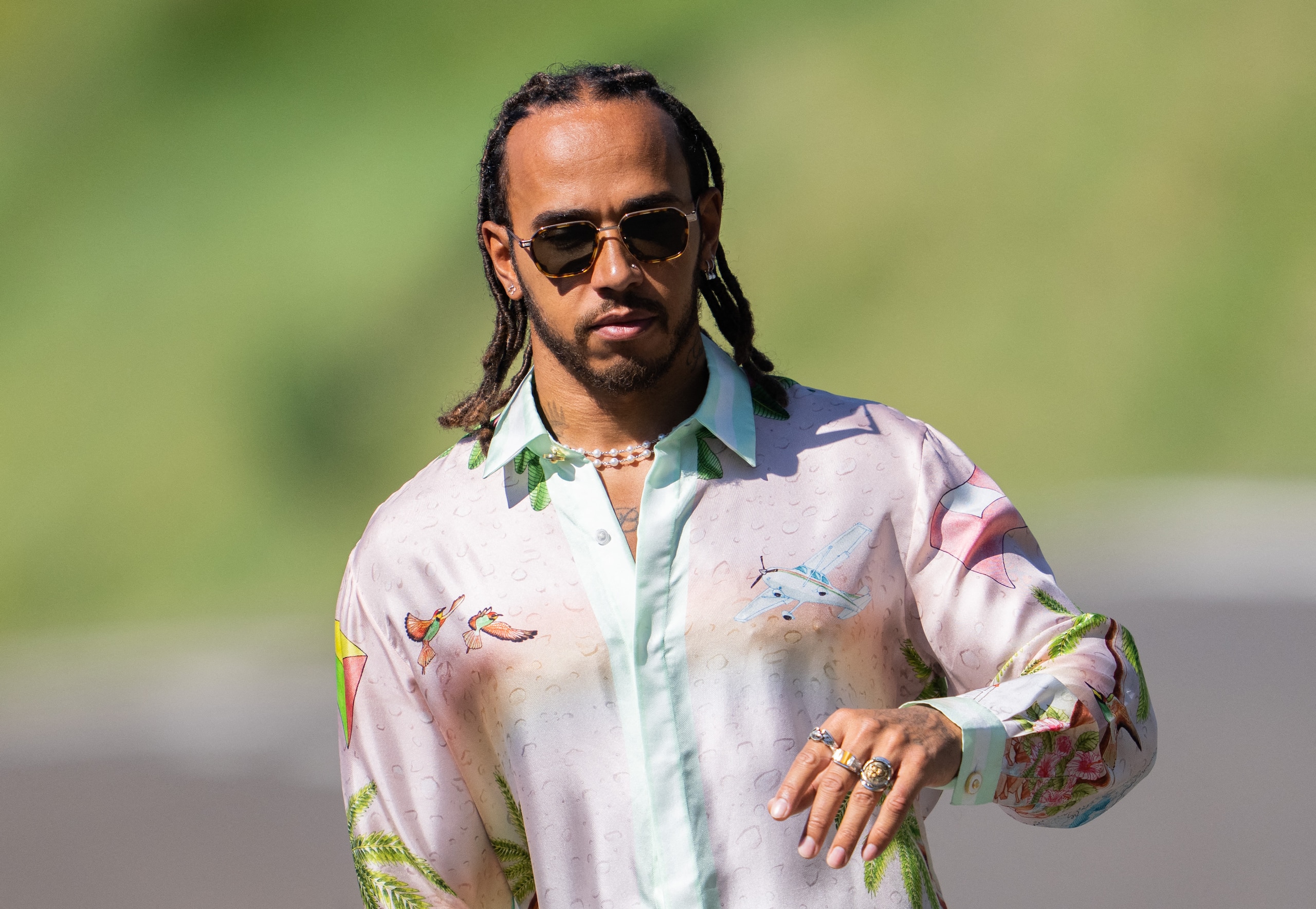 Mercedes' British driver Lewis Hamilton arrives for the third practice session at the Red Bull Ring race track in Spielberg, Austria, on July 3, 2021, ahead of the Formula One Austrian Grand Prix. - Austria OUT (Photo by GEORG HOCHMUTH / APA / AFP) / Austria OUT (Photo by GEORG HOCHMUTH/APA/AFP via Getty Images)