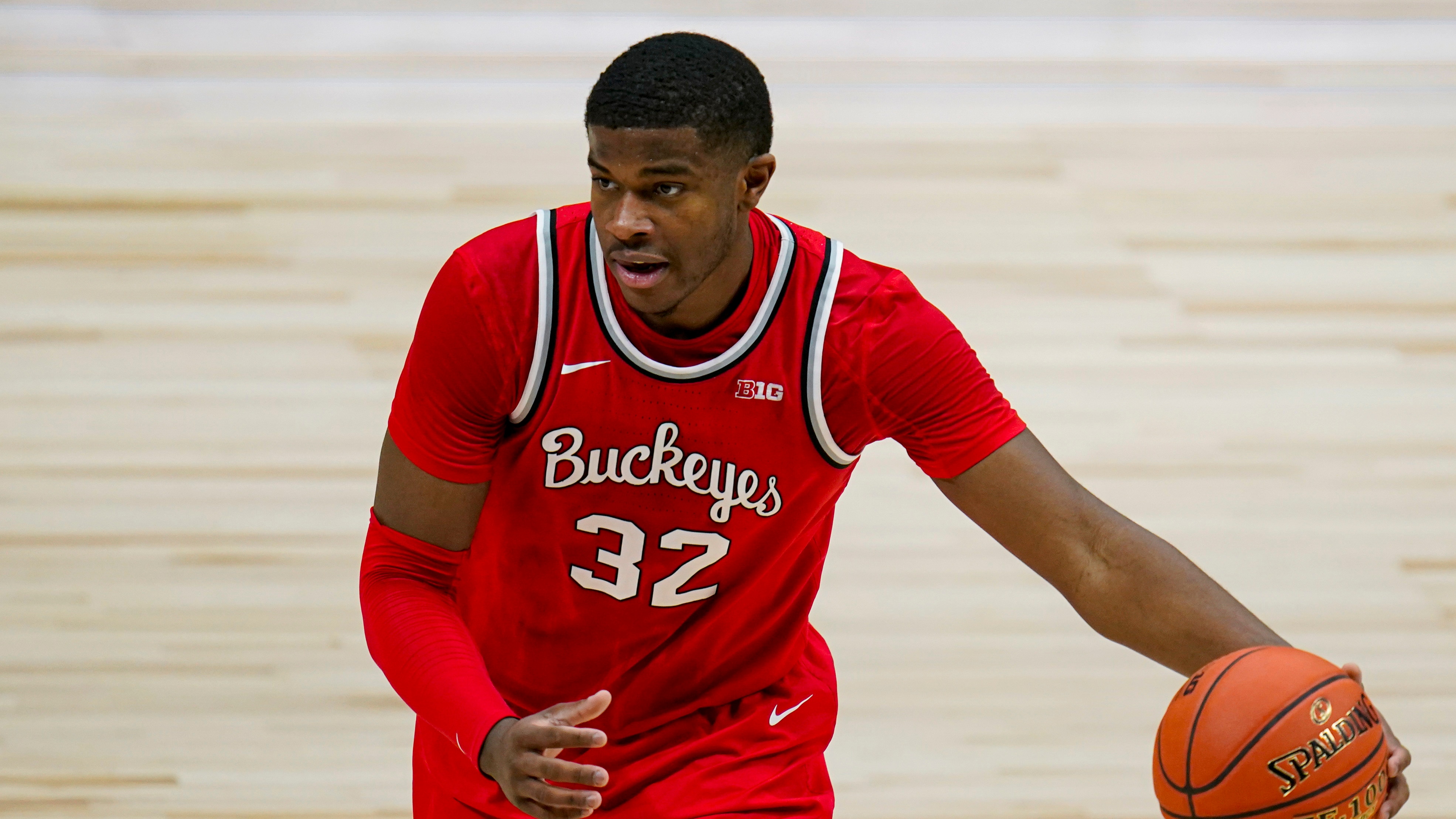 Ohio State forward E.J. Liddell (32) plays against Illinois in an NCAA college basketball championship game at the Big Ten Conference tournament in Indianapolis, Sunday, March 14, 2021. (AP Photo/Michael Conroy)