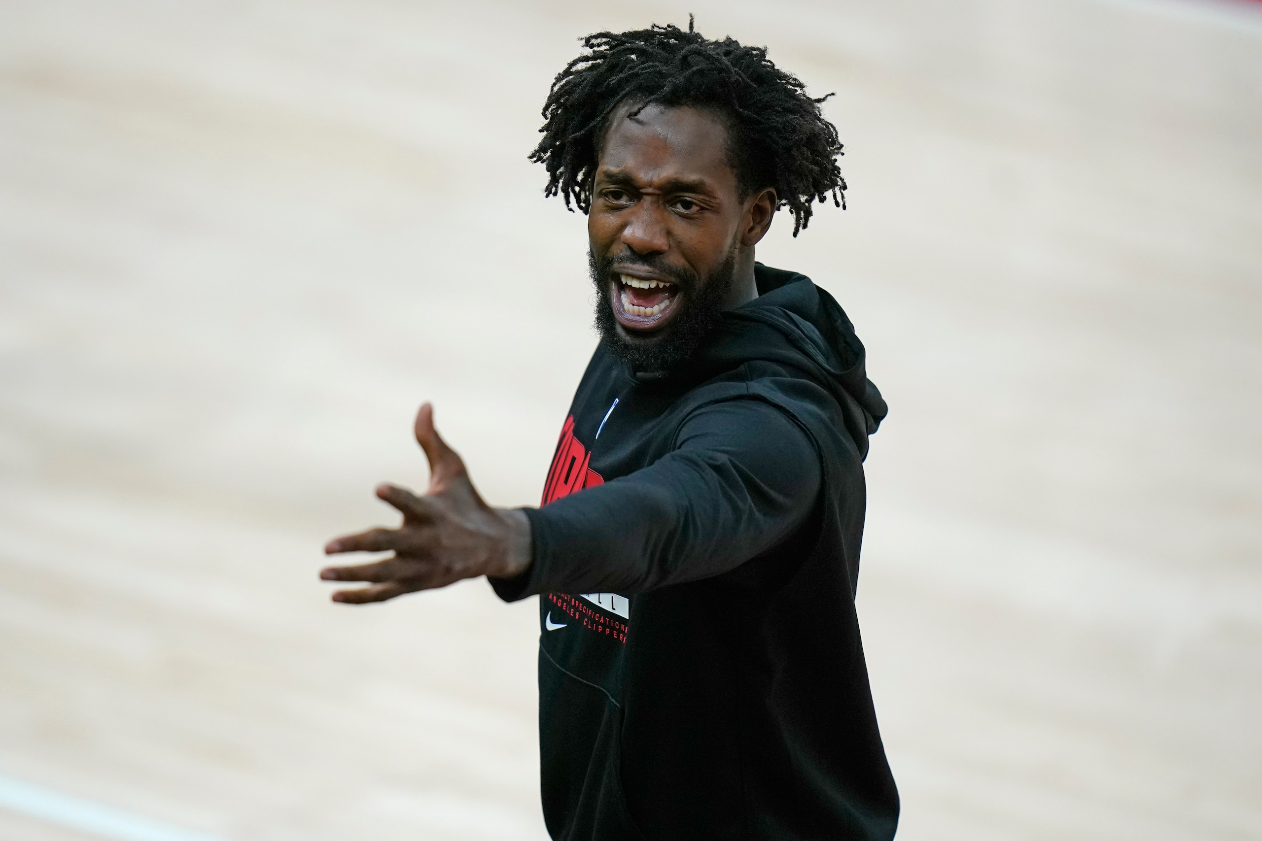Los Angeles Clippers guard Patrick Beverley shouts to a fan before warming up during Game 5 of a second-round NBA basketball playoff series Wednesday, June 16, 2021, in Salt Lake City. (AP Photo/Rick Bowmer) Los Angeles Clippers guard Patrick Beverley shouts to a fan before warming up during Game 5 of a second-round NBA basketball playoff series Wednesday, June 16, 2021, in Salt Lake City. (AP Photo/Rick Bowmer)