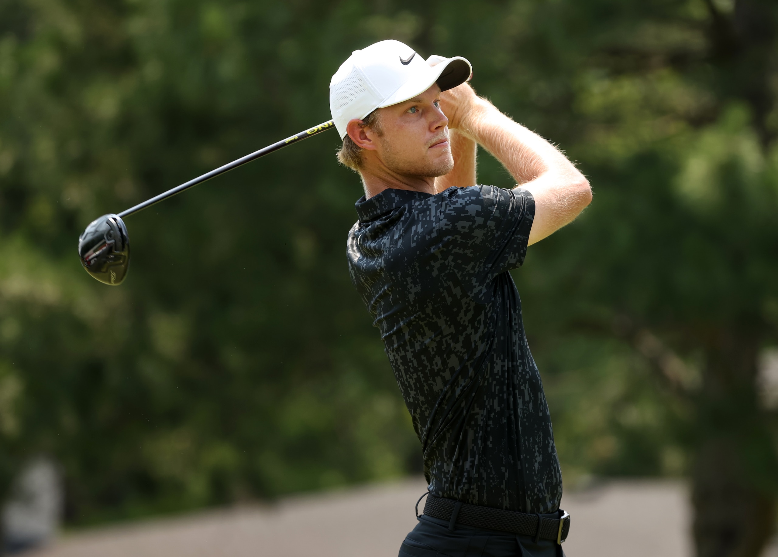 DETROIT, MICHIGAN - JULY 04: Cam Davis of Australia plays his shot from the fourth tee during the final round of the Rocket Mortgage Classic on July 04, 2021 at the Detroit Golf Club in Detroit, Michigan. (Photo by Gregory Shamus/Getty Images)