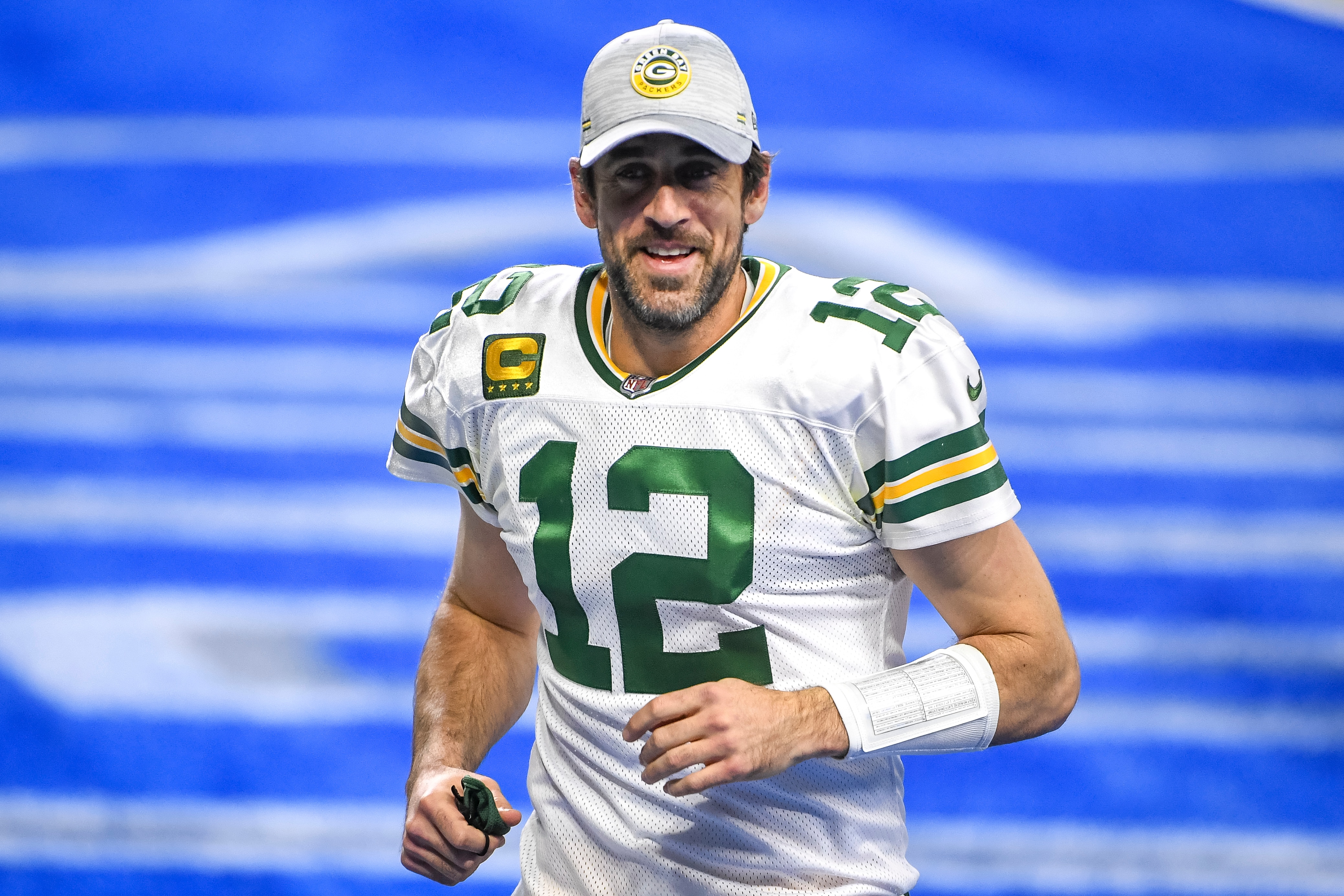 DETROIT, MICHIGAN - DECEMBER 13: Aaron Rodgers #12 of the Green Bay Packers looks on and smiles after the win against the Detroit Lions at Ford Field on December 13, 2020 in Detroit, Michigan. (Photo by Nic Antaya/Getty Images)