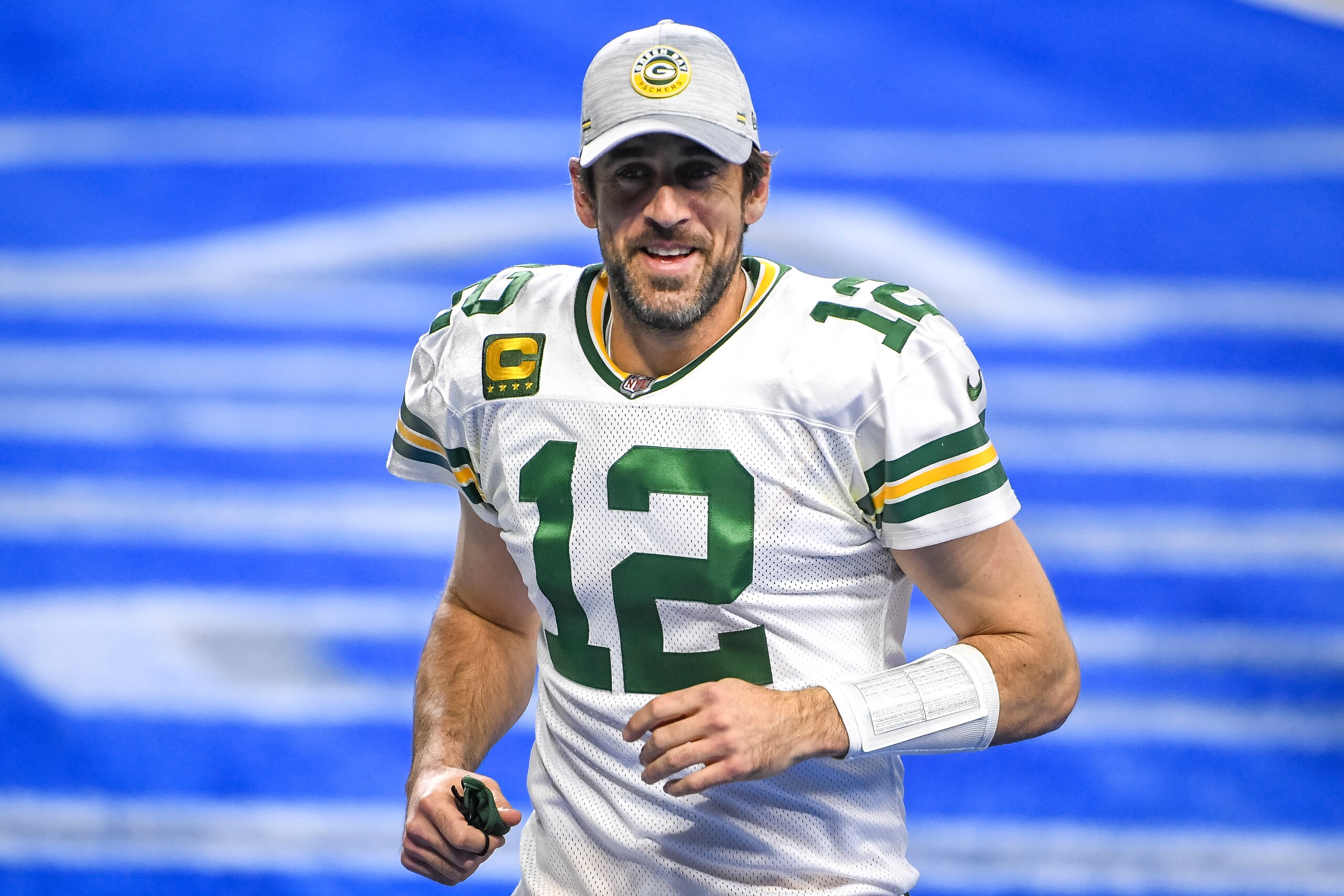 DETROIT, MICHIGAN - DECEMBER 13: Aaron Rodgers #12 of the Green Bay Packers looks on and smiles after the win against the Detroit Lions at Ford Field on December 13, 2020 in Detroit, Michigan. (Photo by Nic Antaya/Getty Images)