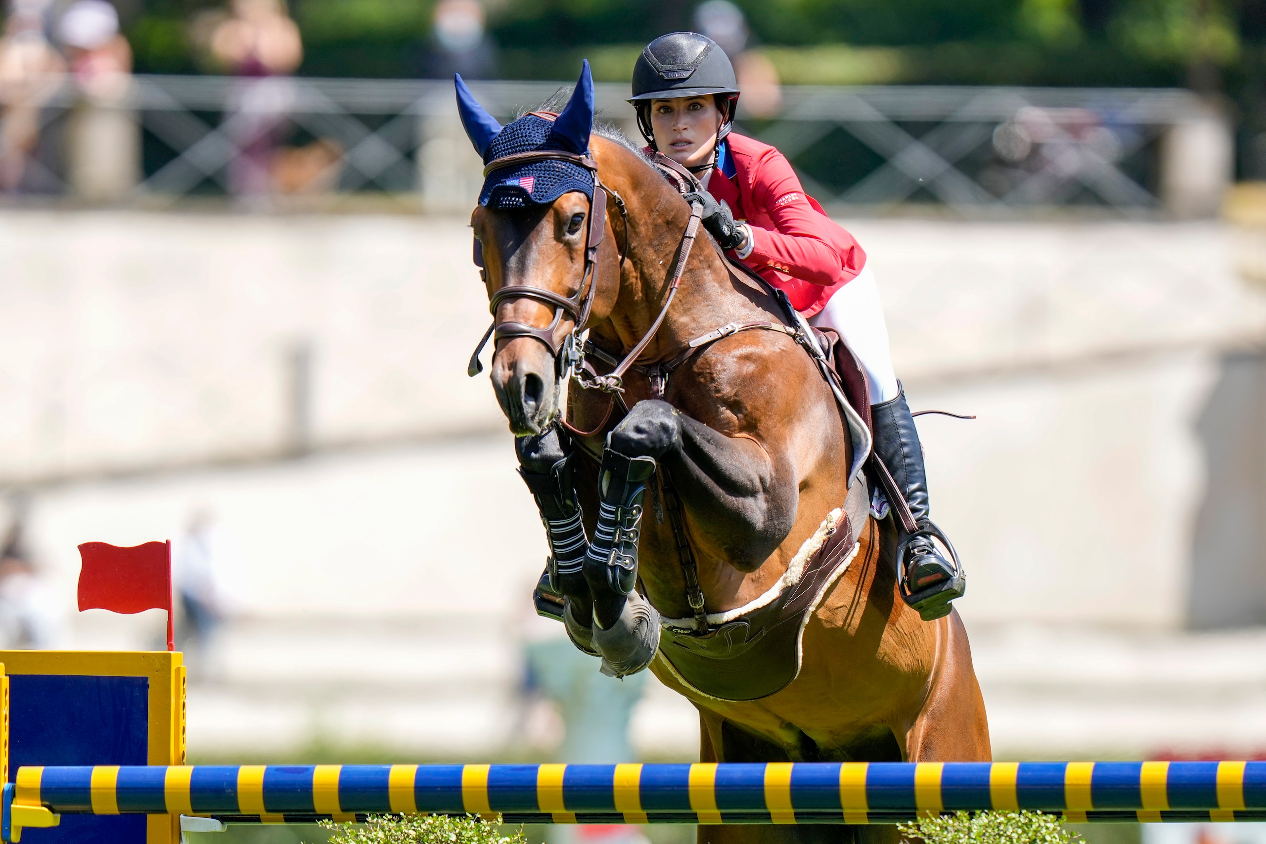 Jessica Springsteen of there United States, on Don Juan Van de Donkhoeve, clears an obstacle during the Nations Cup horse jumping competition, in Rome, Friday, May 28, 2021. (AP Photo/Andrew Medichini)
